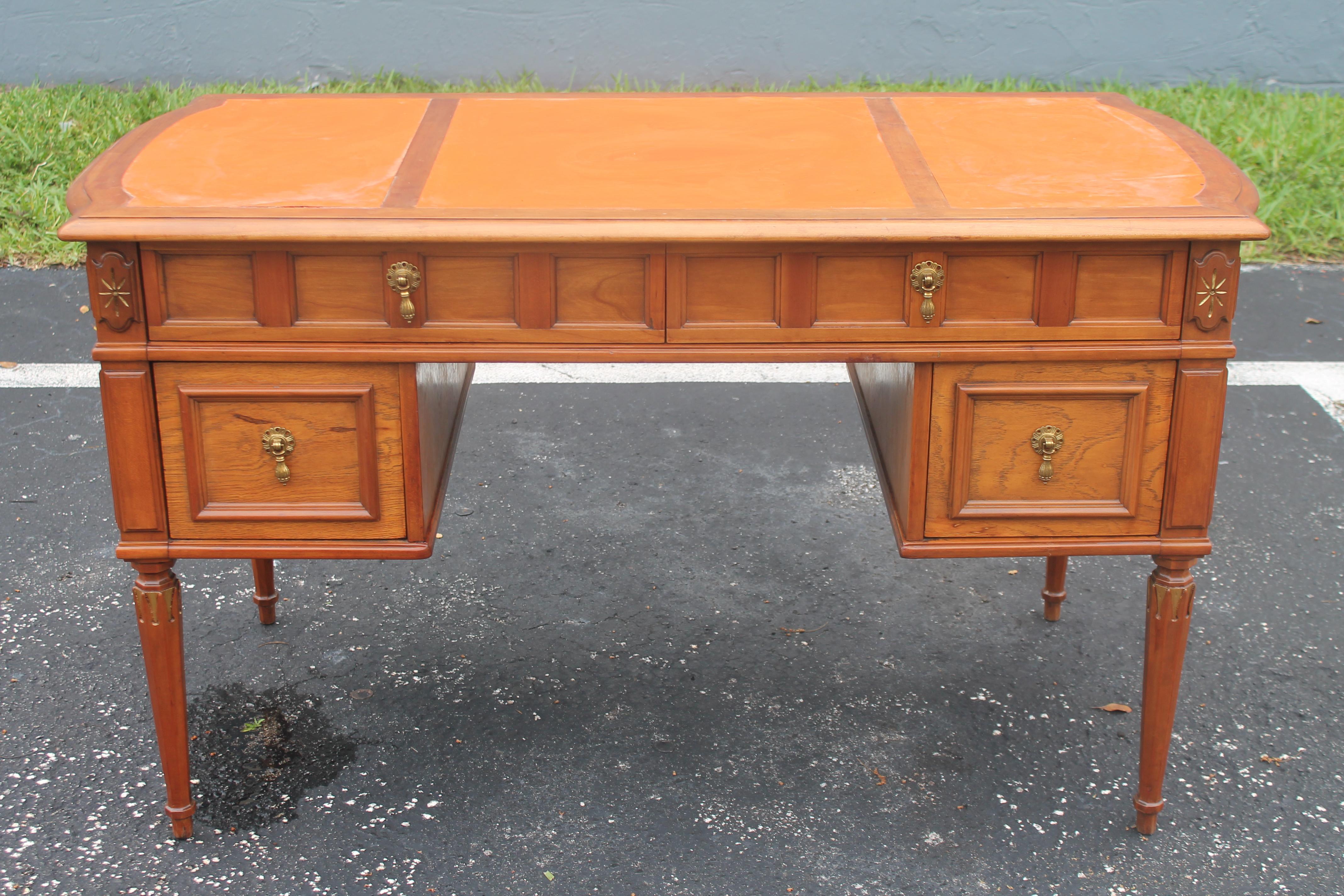 1940's Traditional style Writing Desk with Hermes Leather Top. Beautifully carved with 4 spacious drawers.