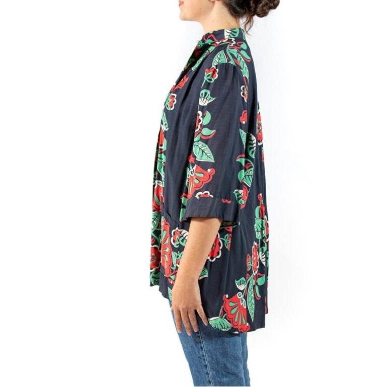 Shows some signs of wear 1940S Tropical Cold Rayon Top 

Decade: 1940s.

Material: Cold Rayon .

Vintage condition: Good.