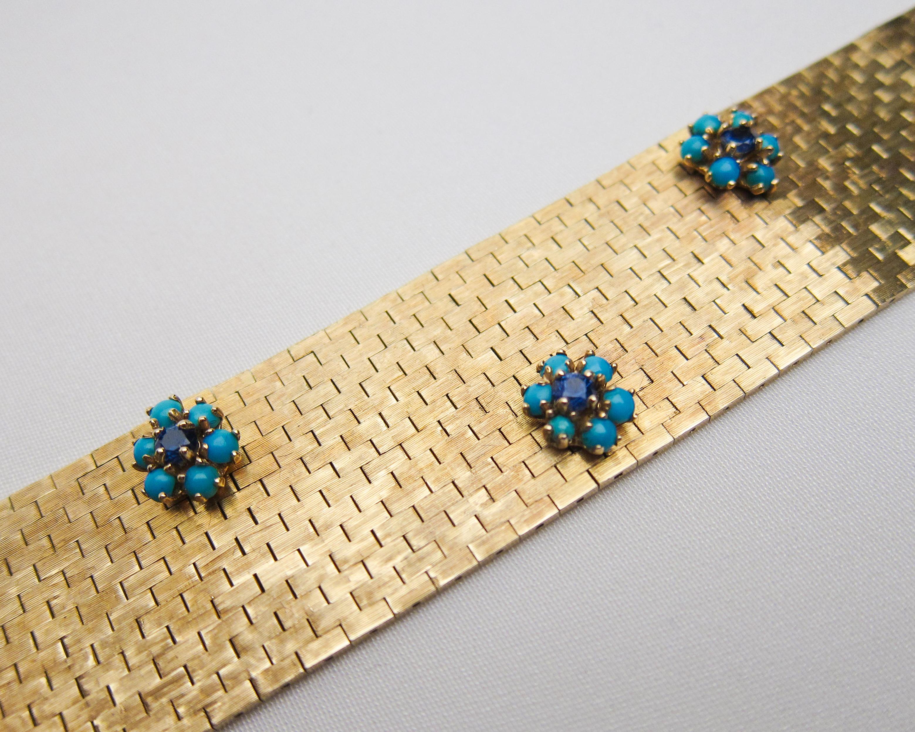Circa 1940. This fabulous 14KT yellow gold Retro Era brick link bracelet is accented with six cluster settings of turquoise and sapphire. The six mixed-cut natural blue sapphires weigh 1.02 carats total. The 36 Persian turquoise cabochons weigh 2.52