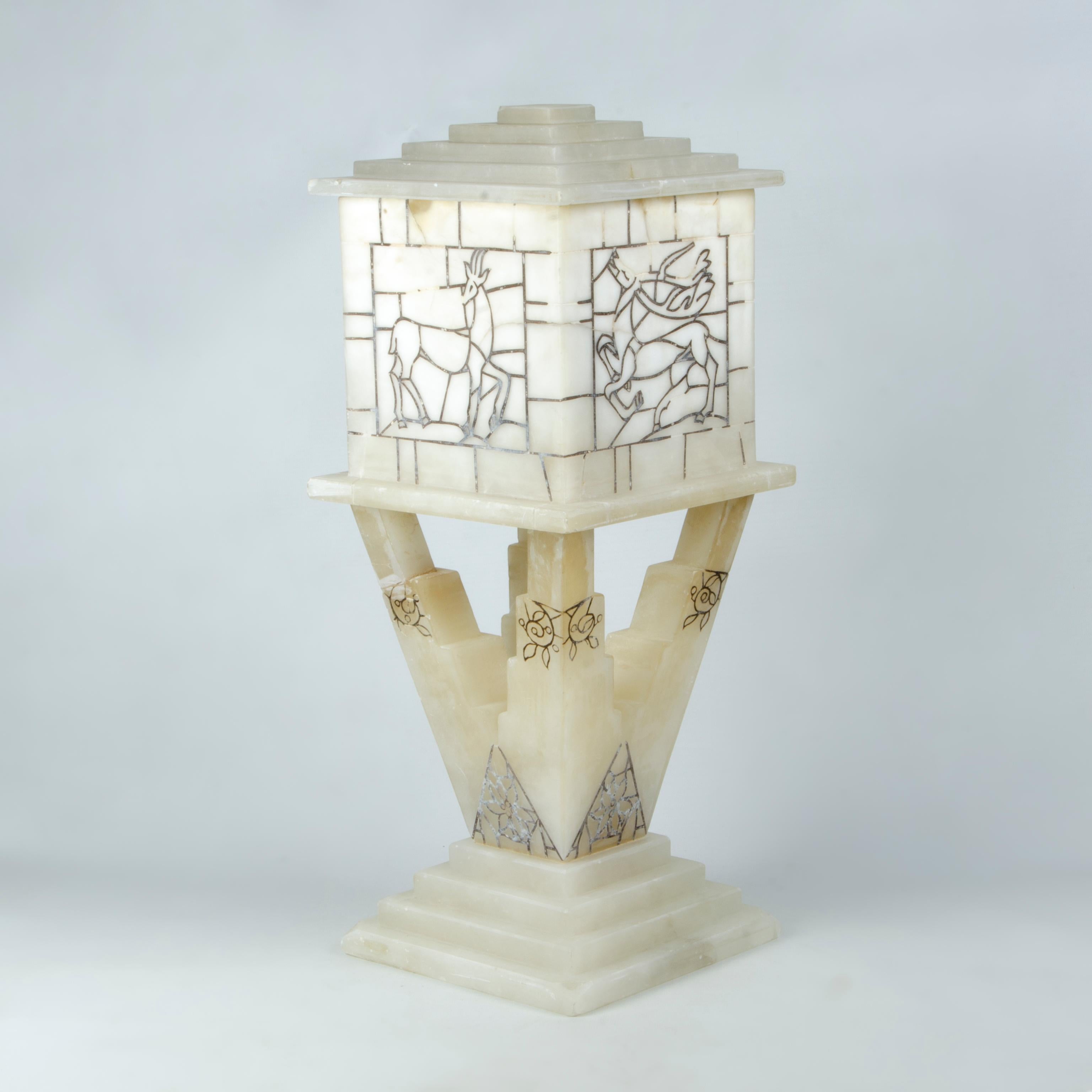 1940s two-bodies white Volterra alabaster table lamp by Bianchi Factory, Italy

By: Bianchi Factory
Material: alabaster, stone, copper, metal
Technique: hand-crafted, cast, molded, metalwork
Dimensions: 8 in x 8 in x 20 in
Date: mid-20th century,