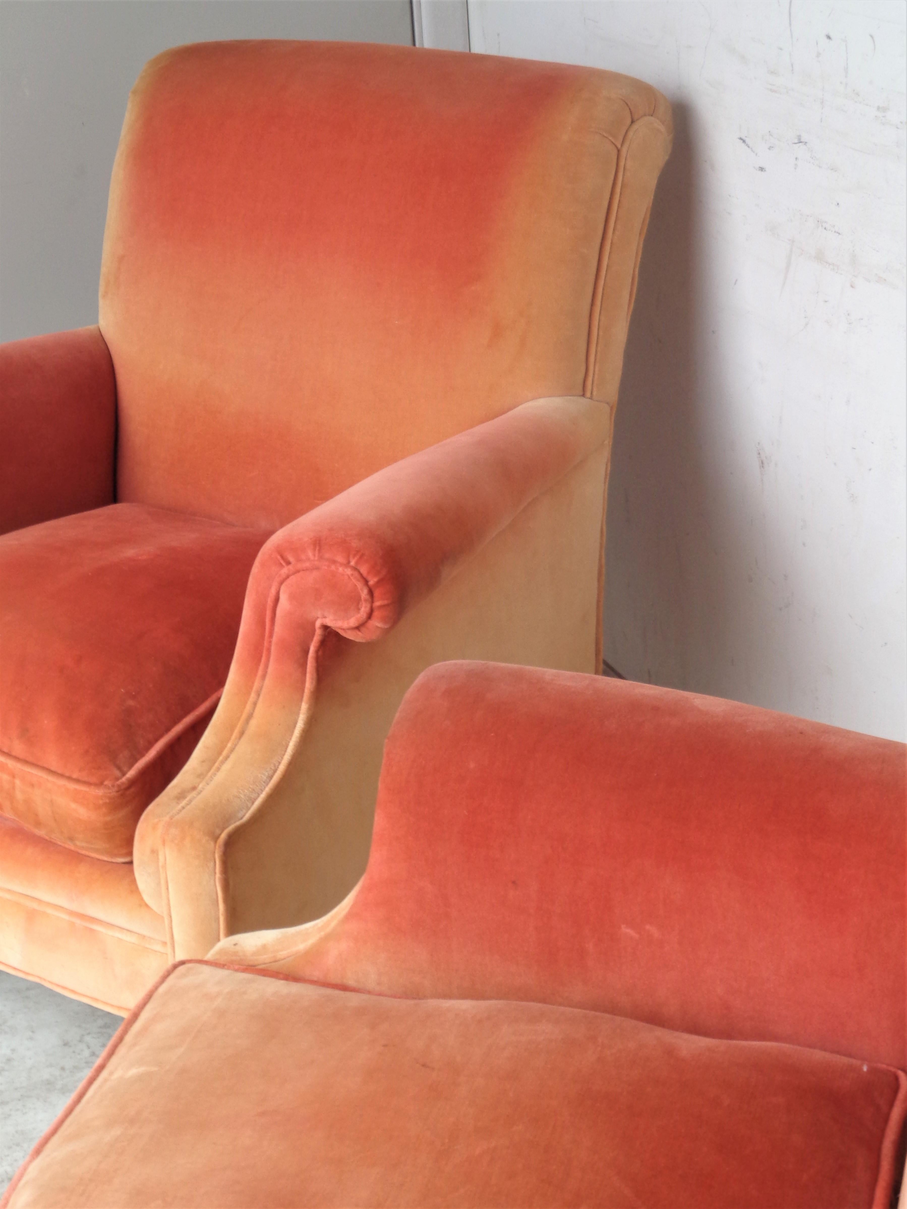 Pair of upholstered lounge chairs w/ rolled arms / rolled backs in the all original beautifully aged faded ombre toned cotton velvet fabric. Circa 1940. Plush comfortable seating. Great looking just the way they are. Look at all pictures and read