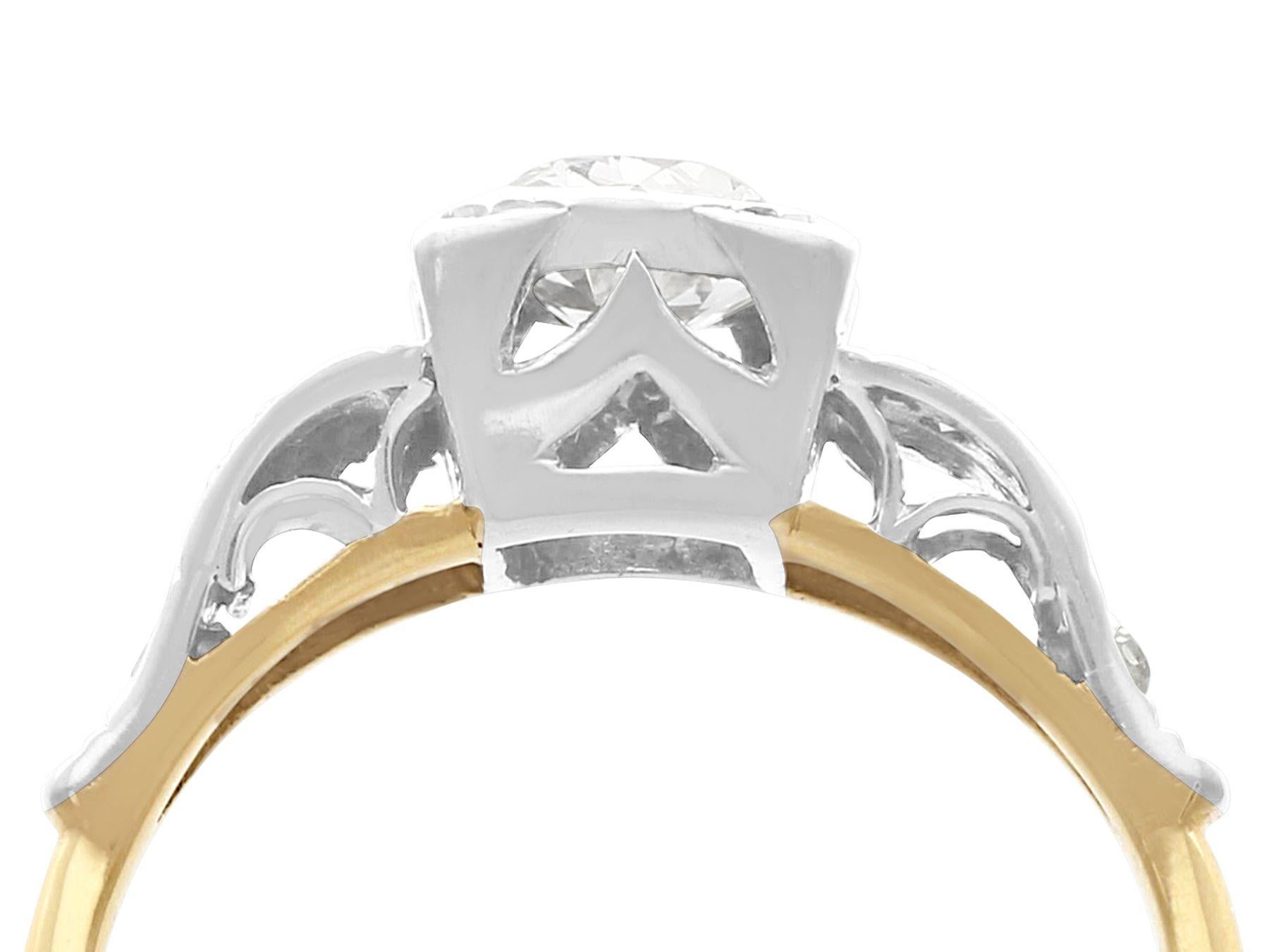 A stunning, fine and impressive vintage 0.87 carat diamond and 18 karat yellow gold, platinum set solitaire ring; part of our diverse diamond jewelry and estate jewelry collections

This stunning 1940s vintage solitaire diamond ring has been crafted