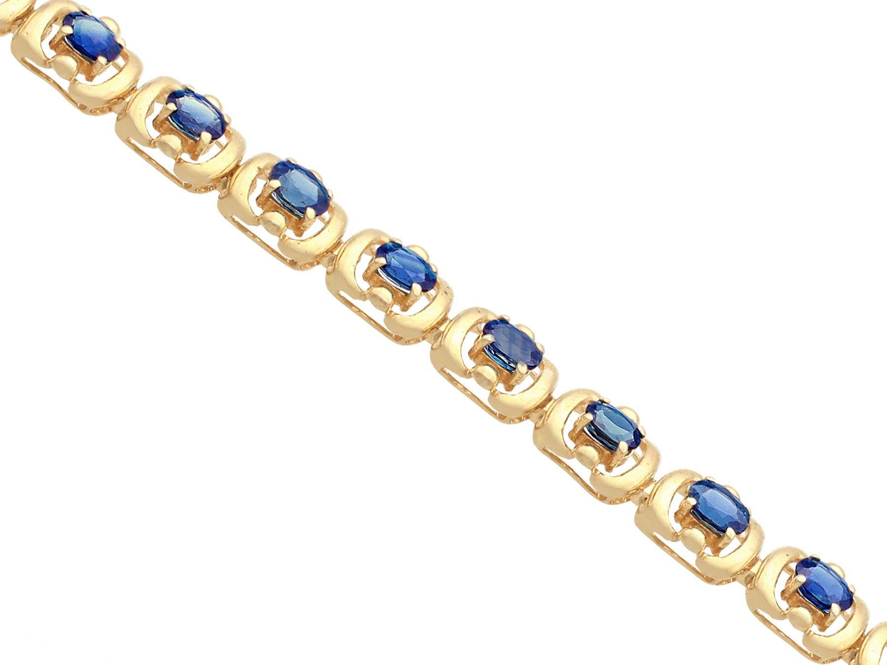 gold bracelet with blue sapphire