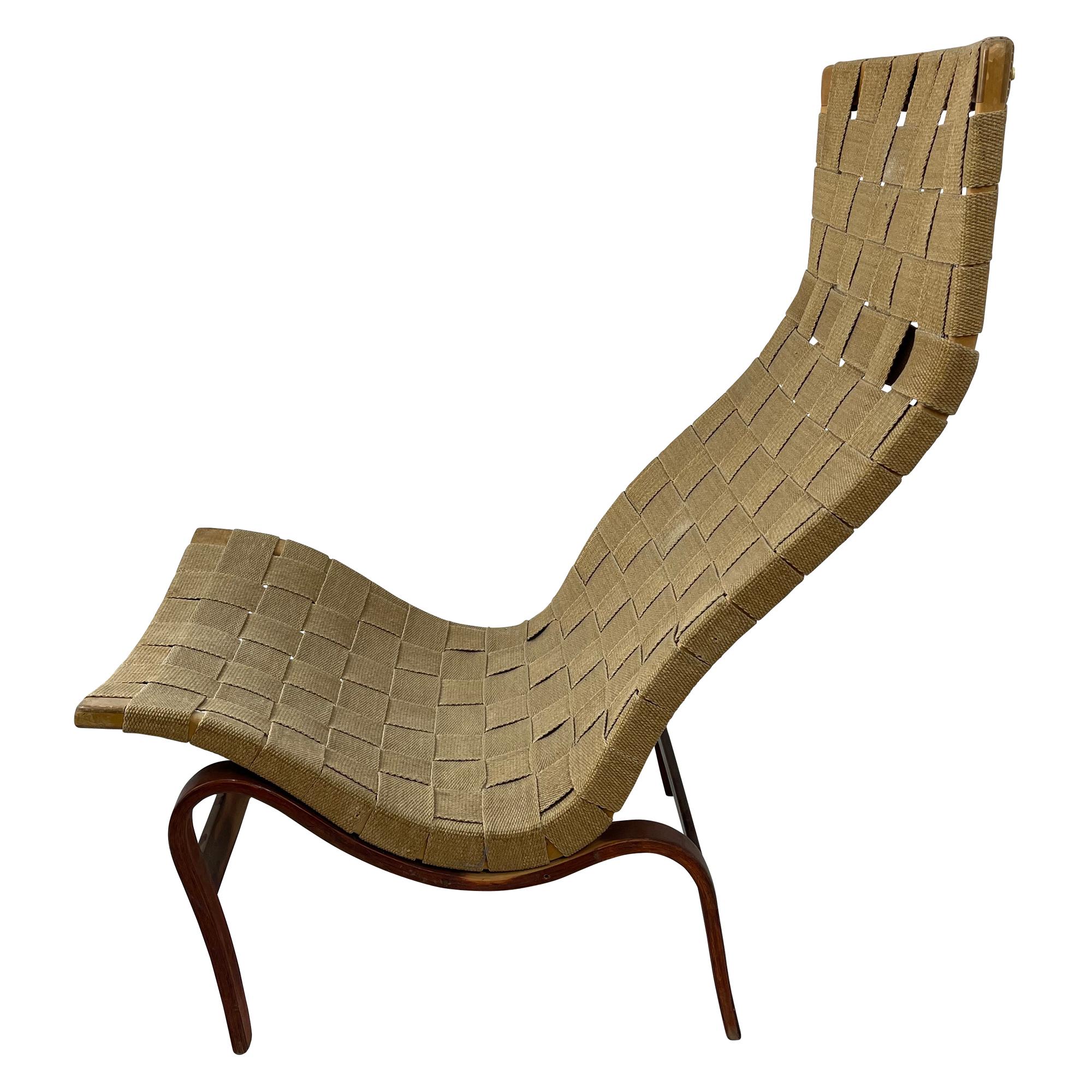 1940's Vintage Eva Chair by Bruno Mattson for Karl Mattson, Sweeden.
Wooden Base with paper cord webbing.