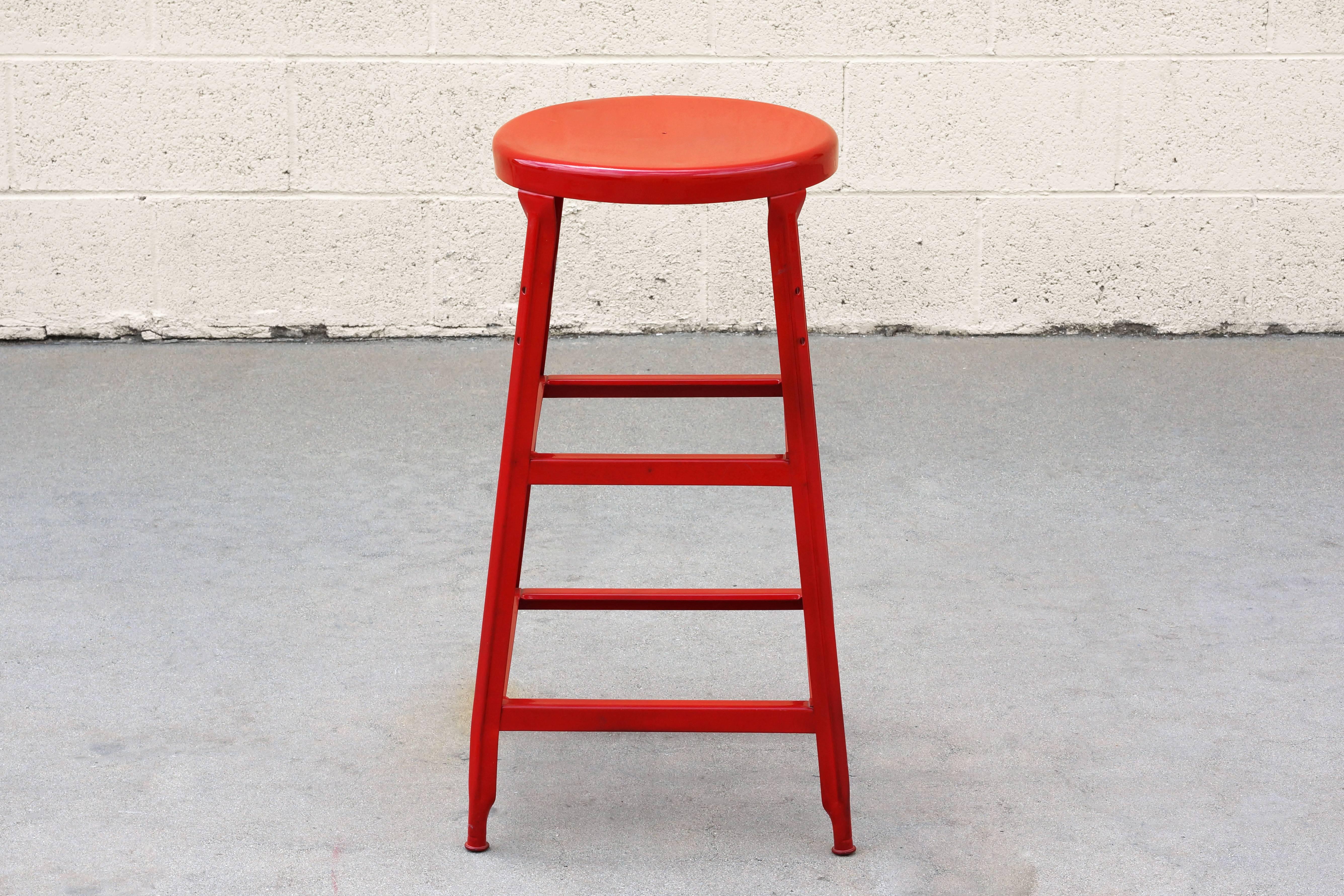 Excellent machine age stool refinished in ruby red, circa 1940s. 

Dimensions: 16