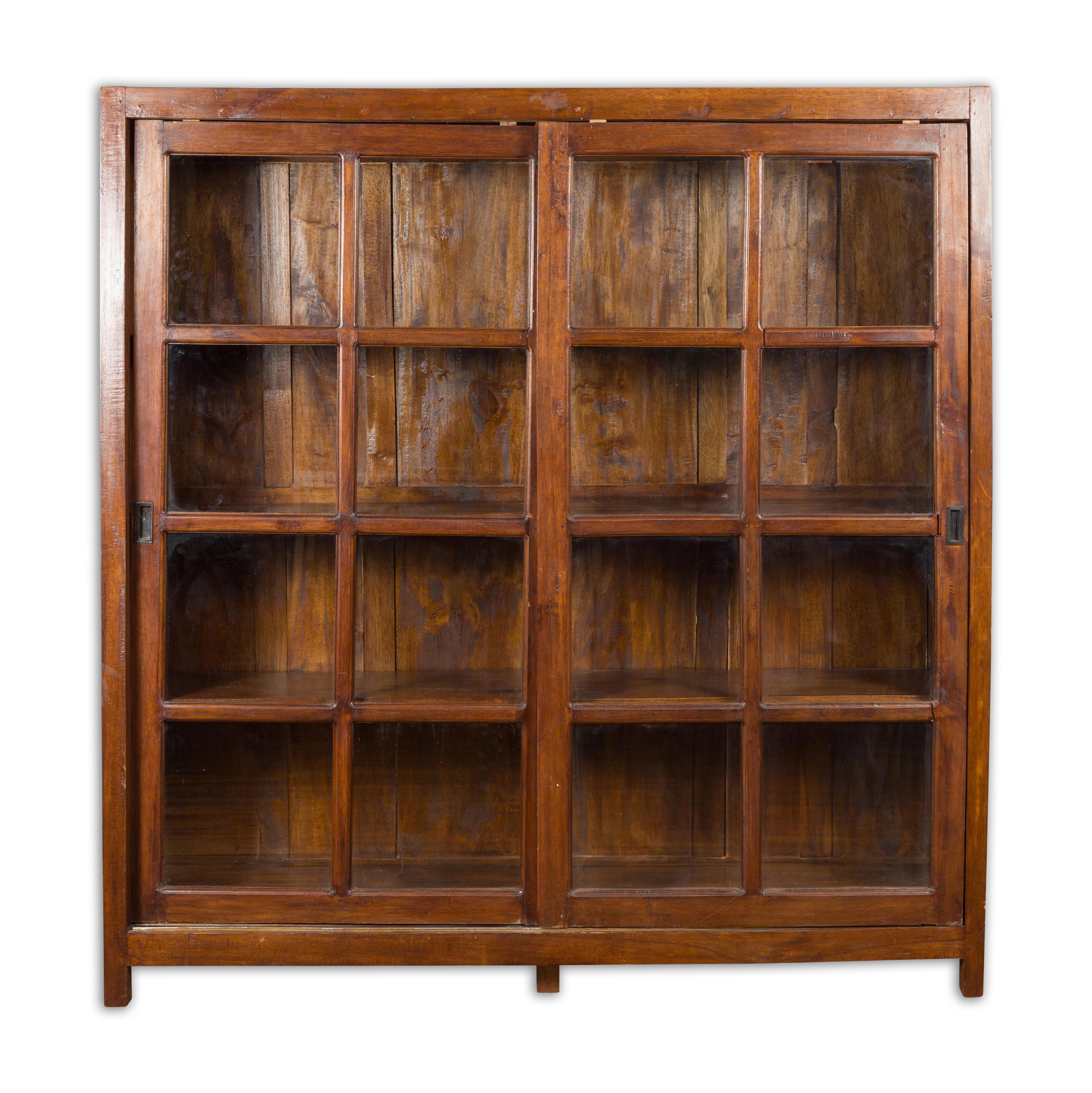 1940s Vintage Javanese Brown Wood Bookcase with Sliding Paneled Glass Doors For Sale 6