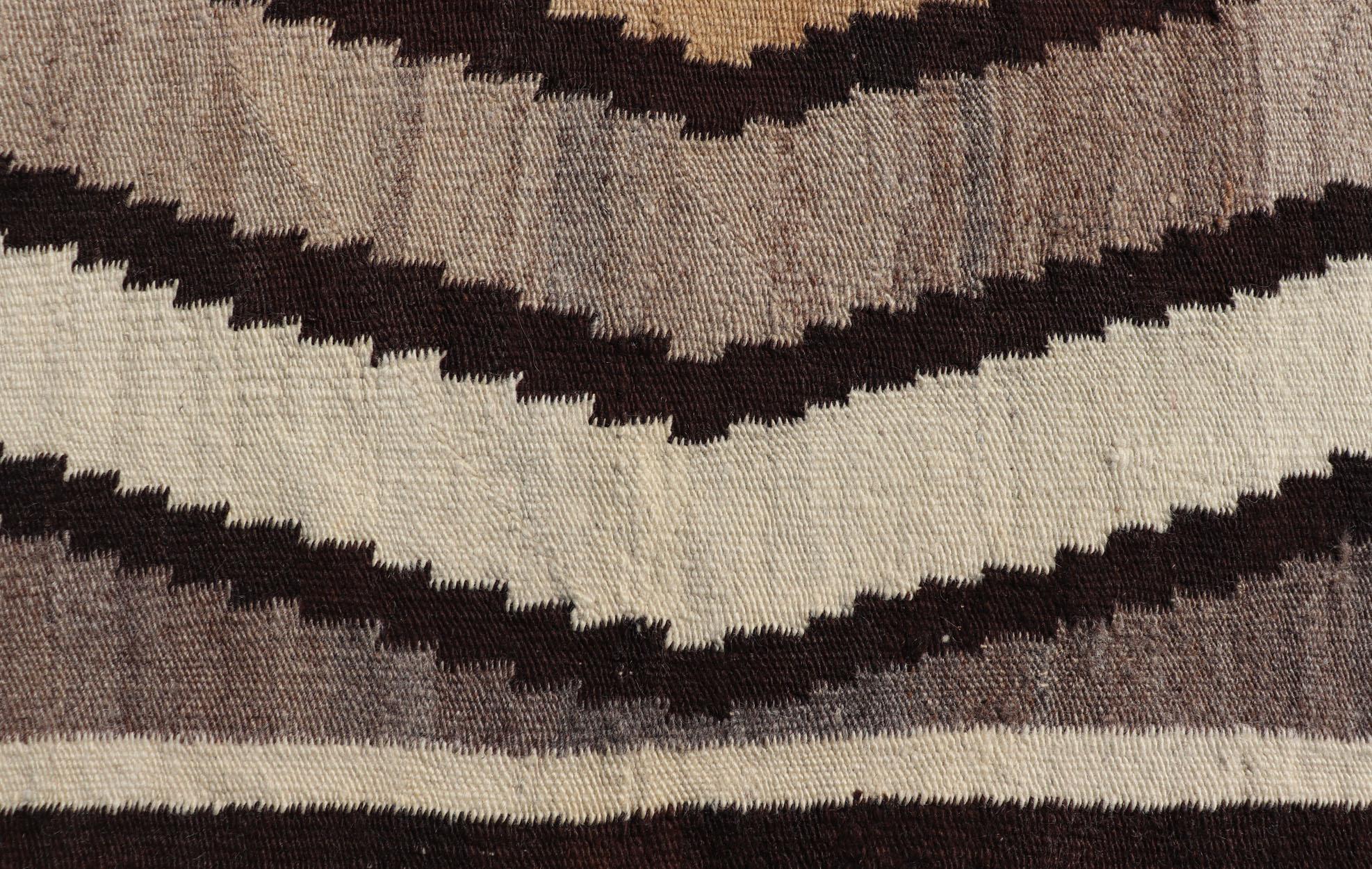 American 1940s Vintage Navajo Kilim with Tribal Diamond Design in Earthy Tones For Sale