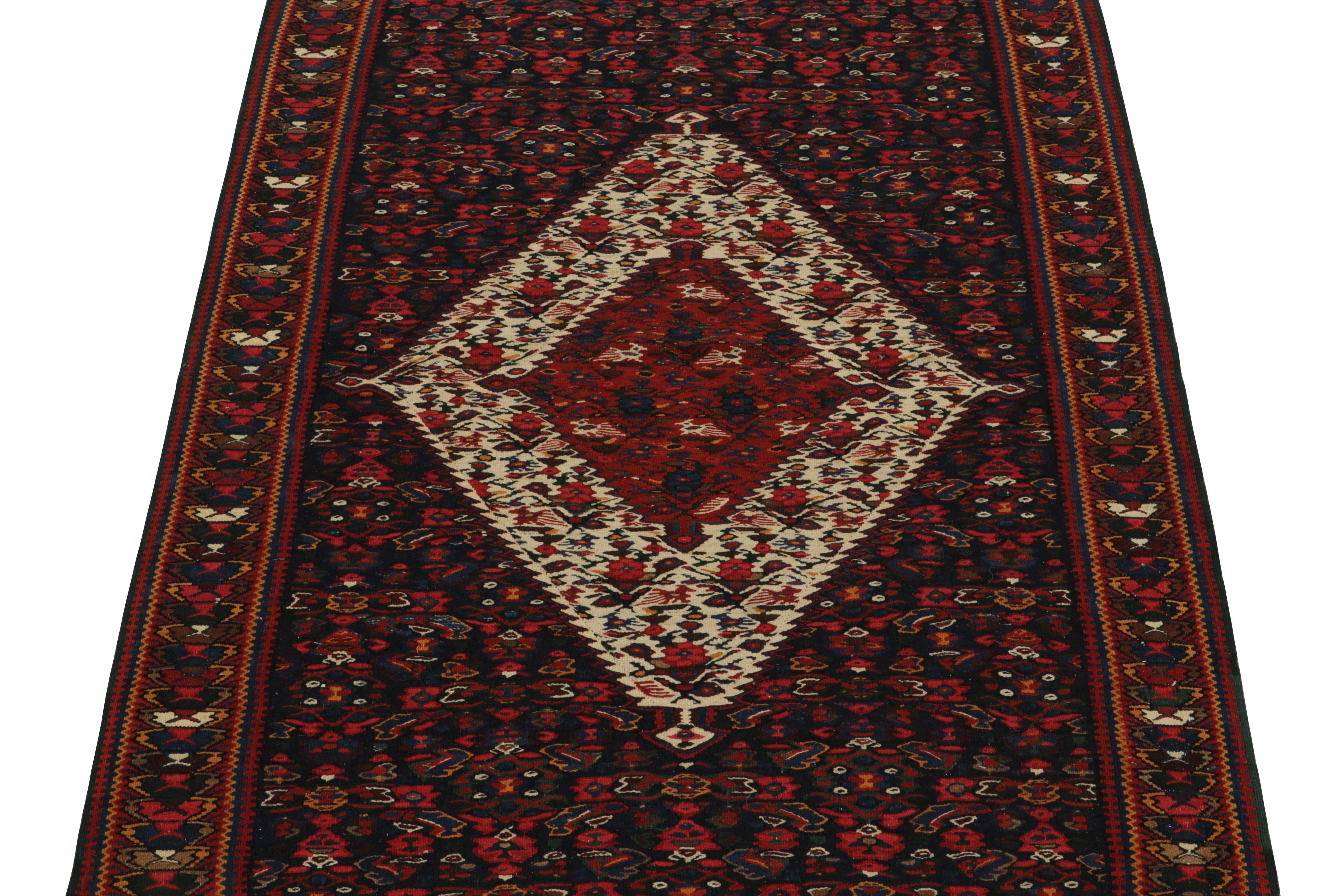 Persian 1940s Vintage Senneh Kilim in Red, Beige-Brown Tribal pattern by Rug & Kilim For Sale