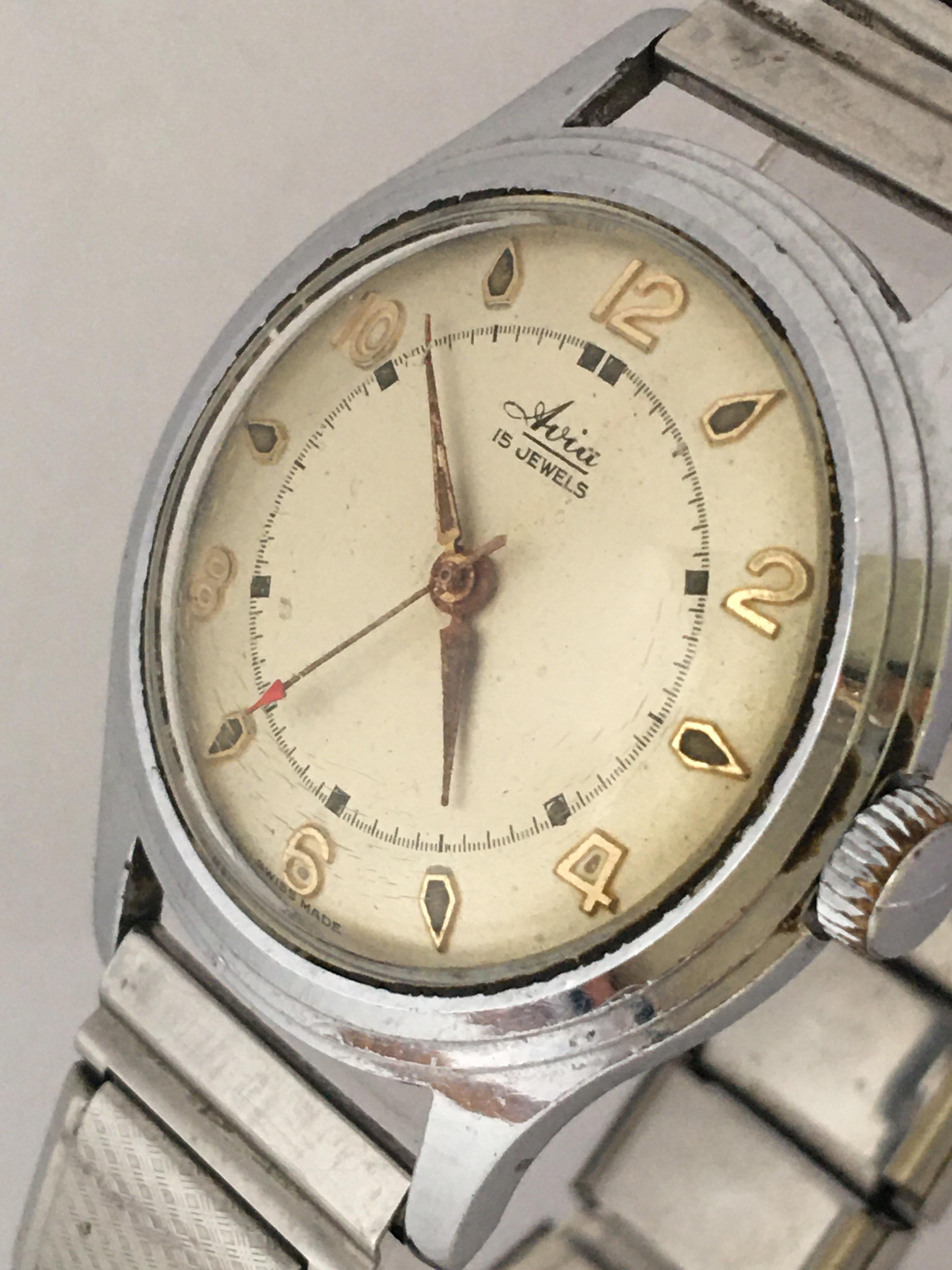 This beautiful pre-owned vintage manual winding watch is working and it is running well. Visible signs of wearing and ageing with some scratches on the glass and on the watch case. The winder, hands and its case are a bit tarnished as shown.

Please
