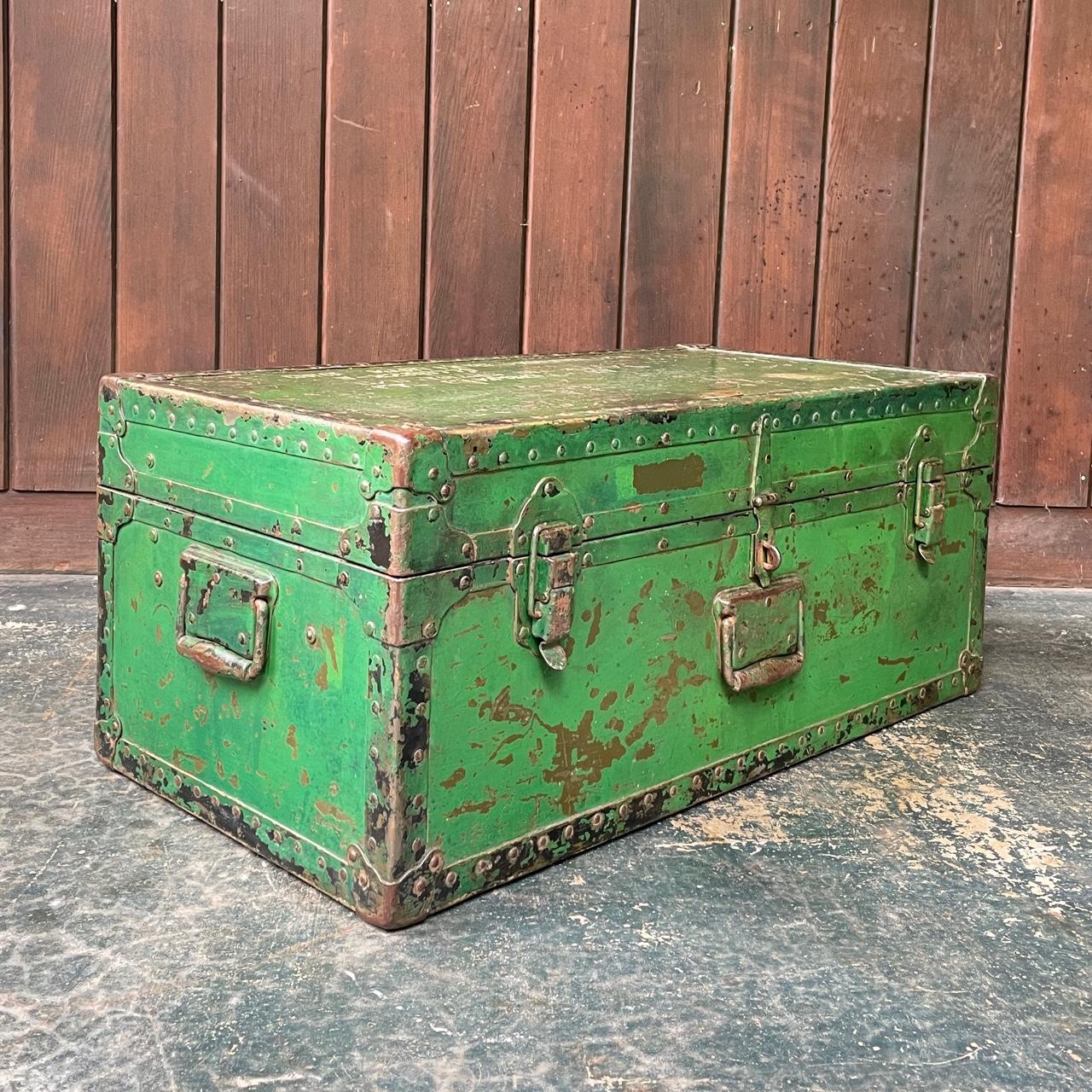 Made in the 1940s, but used in the Korean and Vietnam Eras.  A heavily patinated vulcanized trunk with brass, steel, and vulcanized rubber cornering/edging.  This case has more uncommon flight handles on it, was used by a Helicopter pilot.  Now