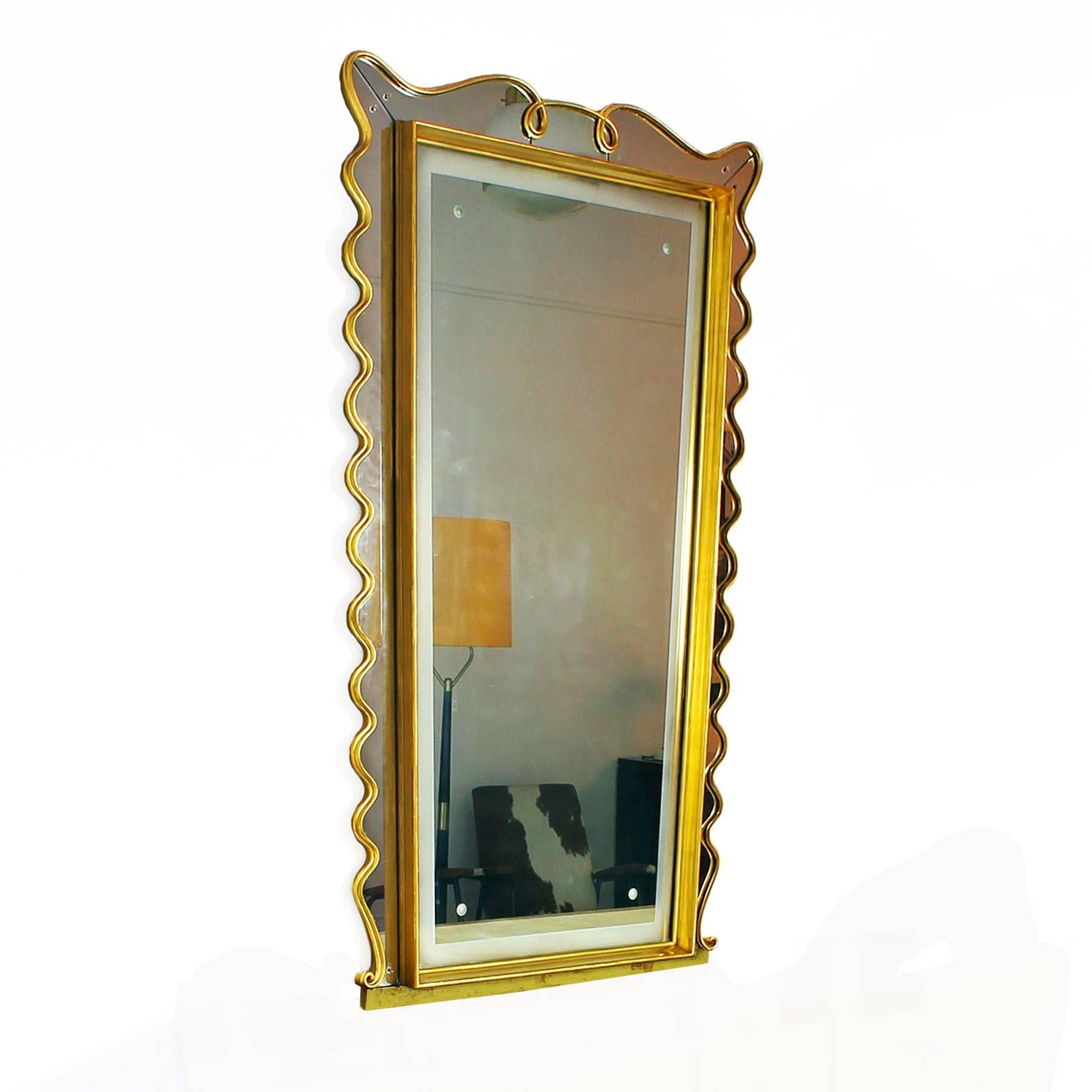 Spectacular original mirror decorated with acid etched circles and strip, golden leaf stucco frame.

Italy, circa 1940.

Measurements:
Width: Top 98 cm - Bottom 85 cm
Depth: 7 cm
Height: 164 cm