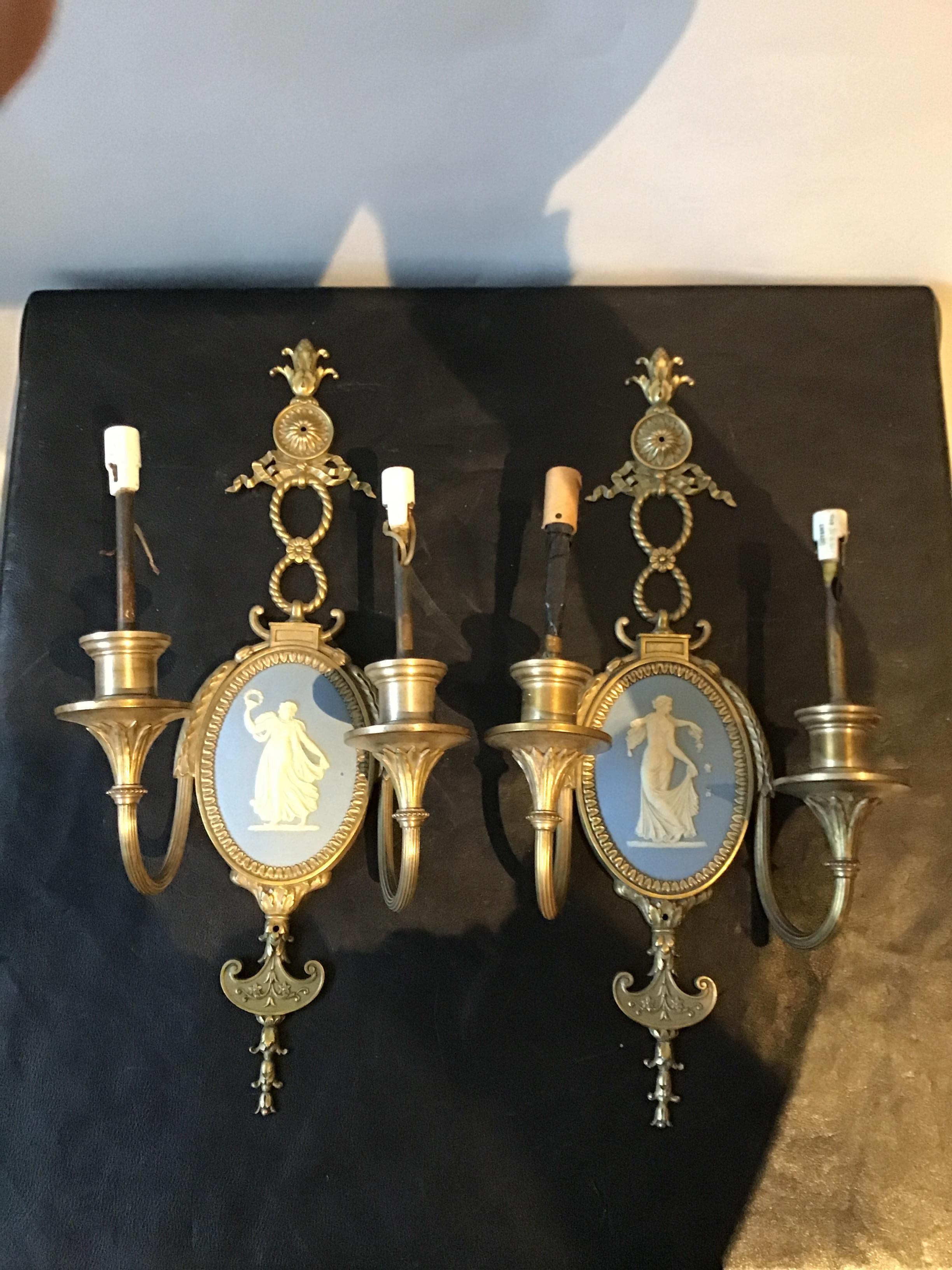 1940s Wedgwood sconces. Silver plate sconces with a brass finish. In places where the brass was polished away, silver plate shows through.