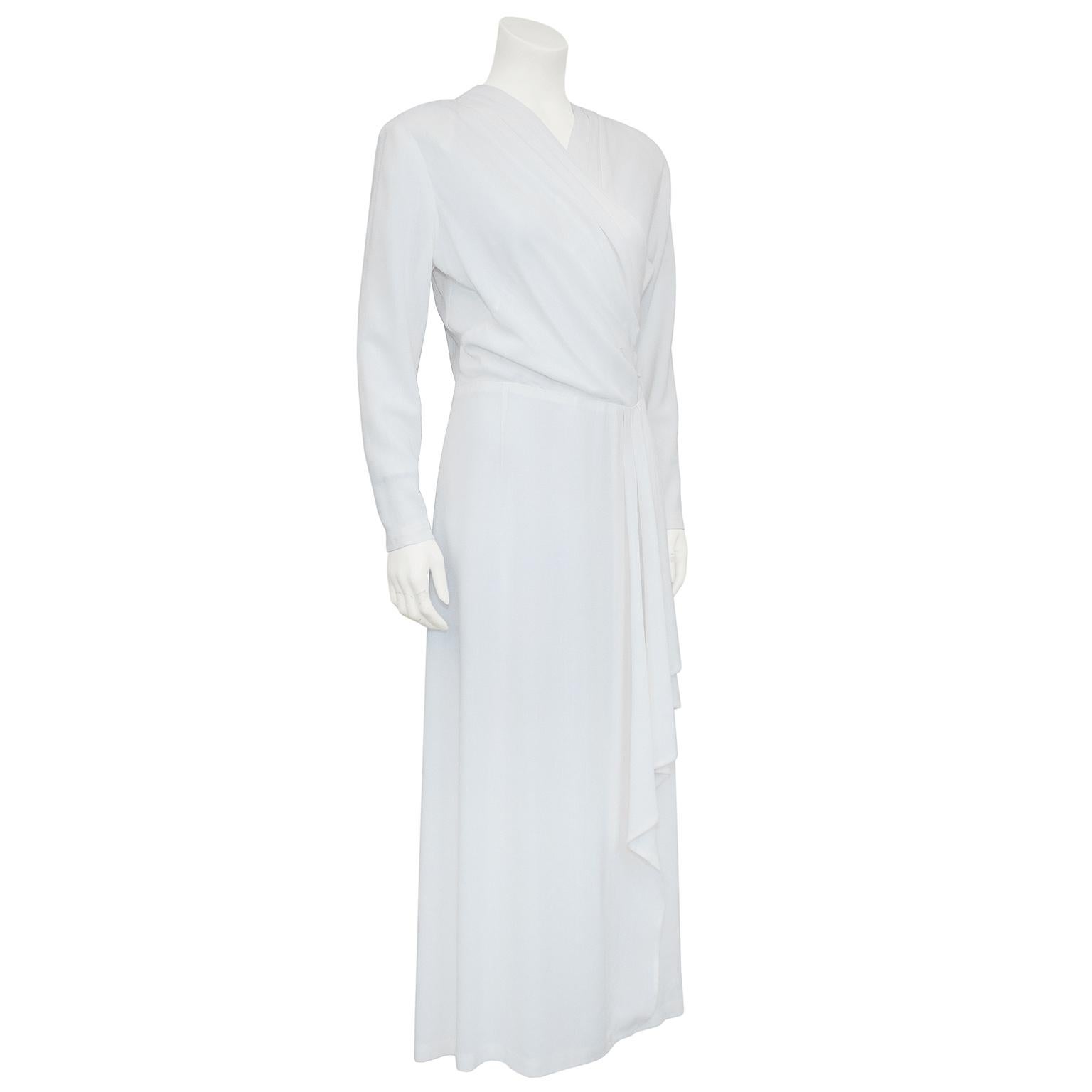 1940's white rayon crepe old Hollywood style dress with draped swag. Loosely gathered across the front bodice, fitted at the waist, mid calf length. Unusual to find a white dress from the 1940's in such excellent condition. The silhouette