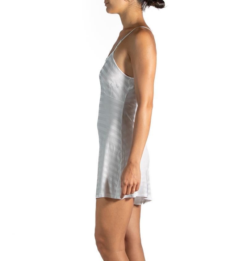 1940S White Striped Rayon Step In Slip Dress
MORPHEW VINTAGE represents the finest pieces of fashions past. Sourced from across the globe, dating as far back as a century. Each piece is selected with both quality and rarity in mind. Often referred
