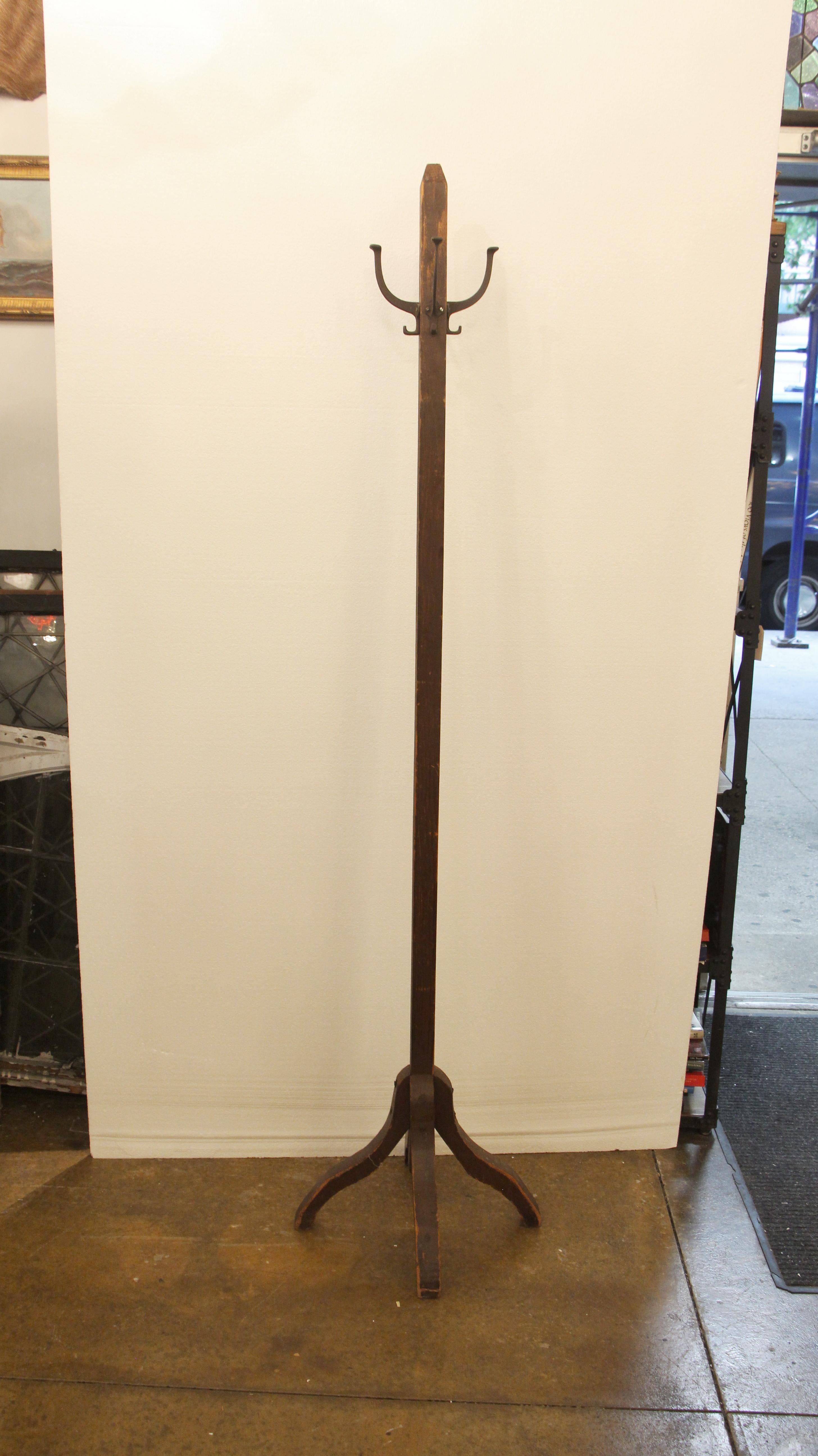 Wood hallway coat tree rack stand from the 1940s. This can be viewed at one of our New York City locations. Please inquire for the exact address.