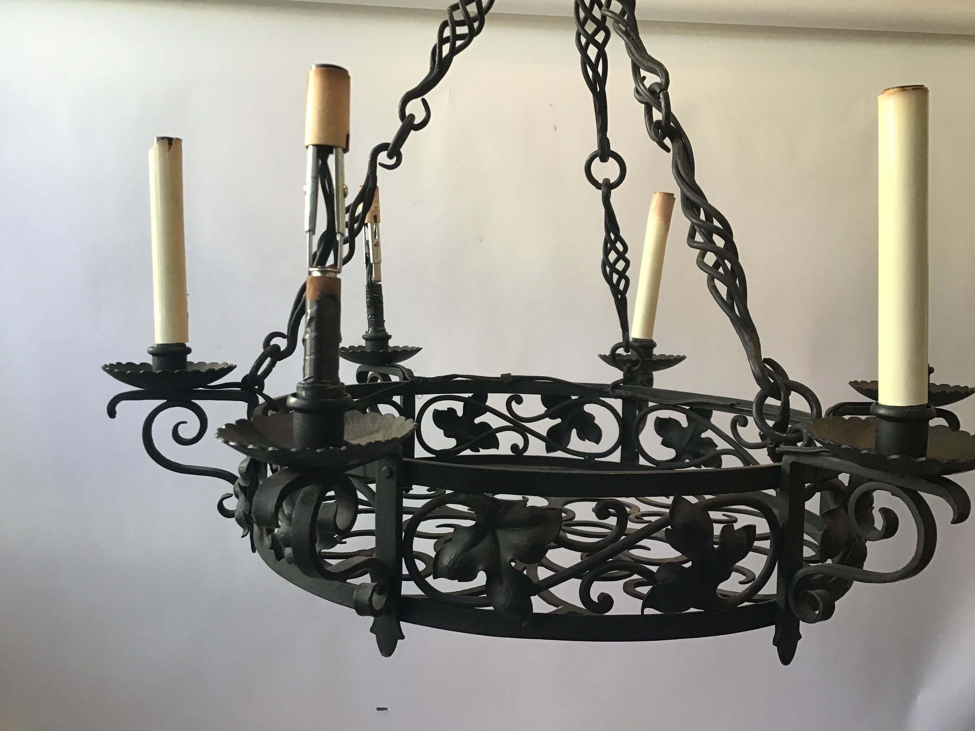 round black iron chandelier