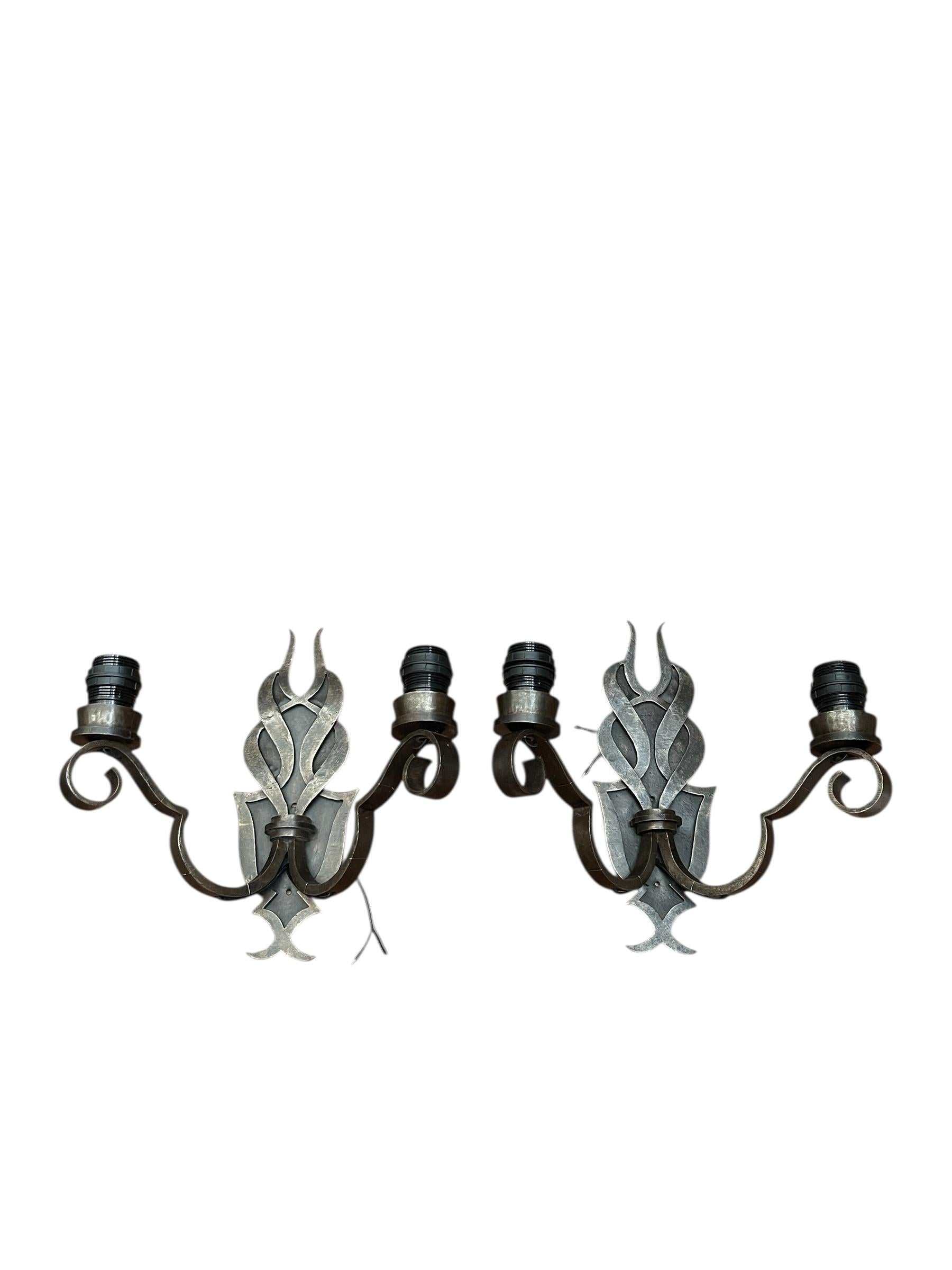 1940's Wrought iron sconces showing flames 
attributed to Raymond Subes
Great quality
France
Re-wired with E-27 sockets
