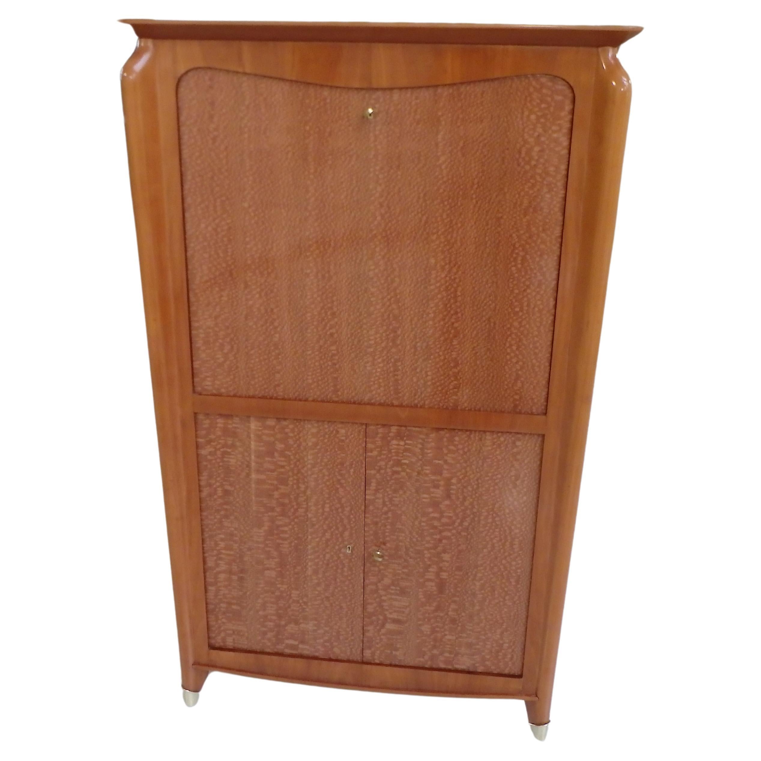 1940this Art Deco dry bar birch with on the doors brass decor on the legs For Sale