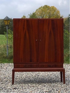 1940ties Danish cabinetmaker cupboard on legs. Made in mahogany.