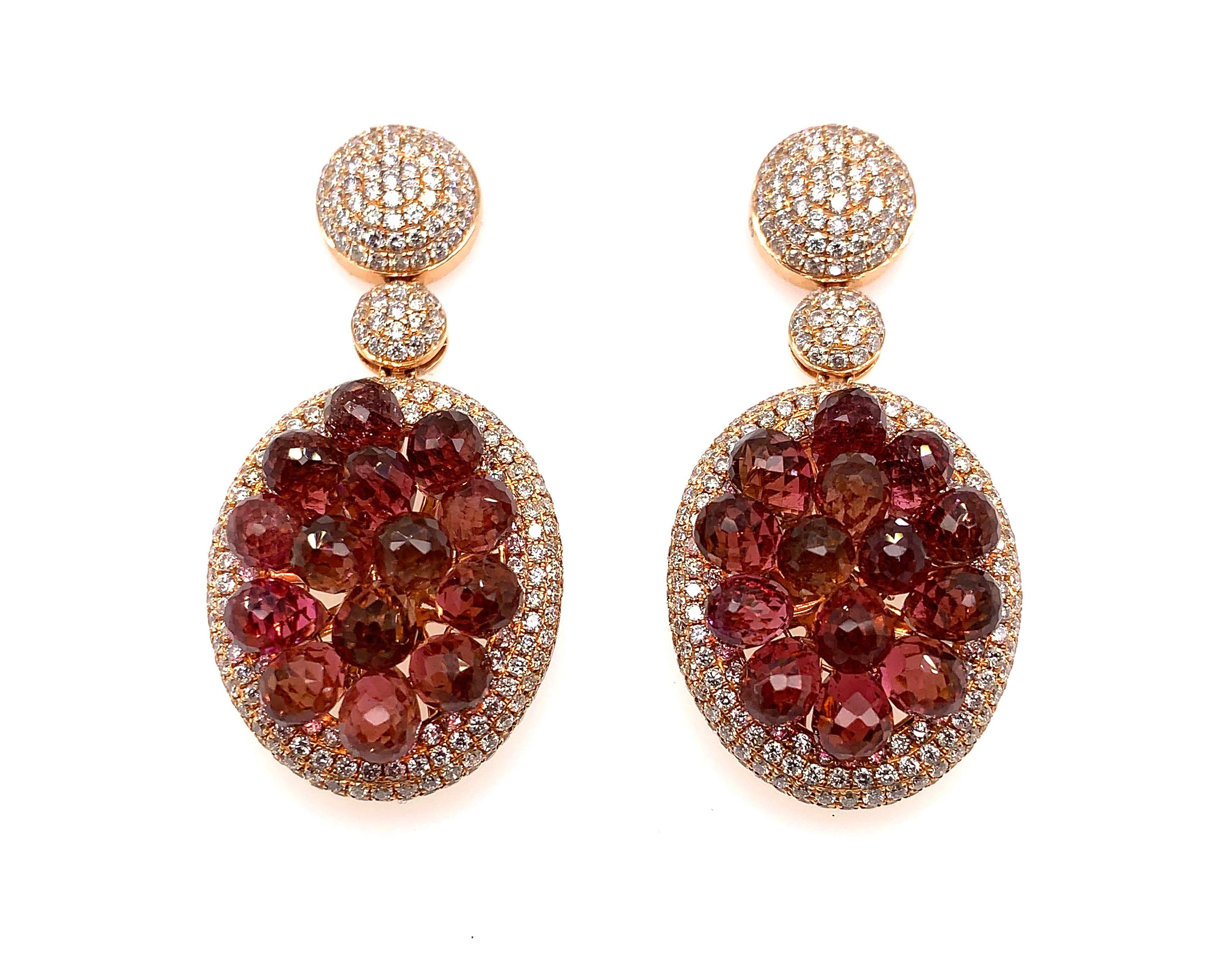 Fancy a grape? Well how about a bunch of them?

Sunita Nahata uses a cluster of the brightest pink tourmalines to recreate a grape-like look. Perfect to be styled for any summer occasion, these earrings sit playfully on any ear. The rose gold and