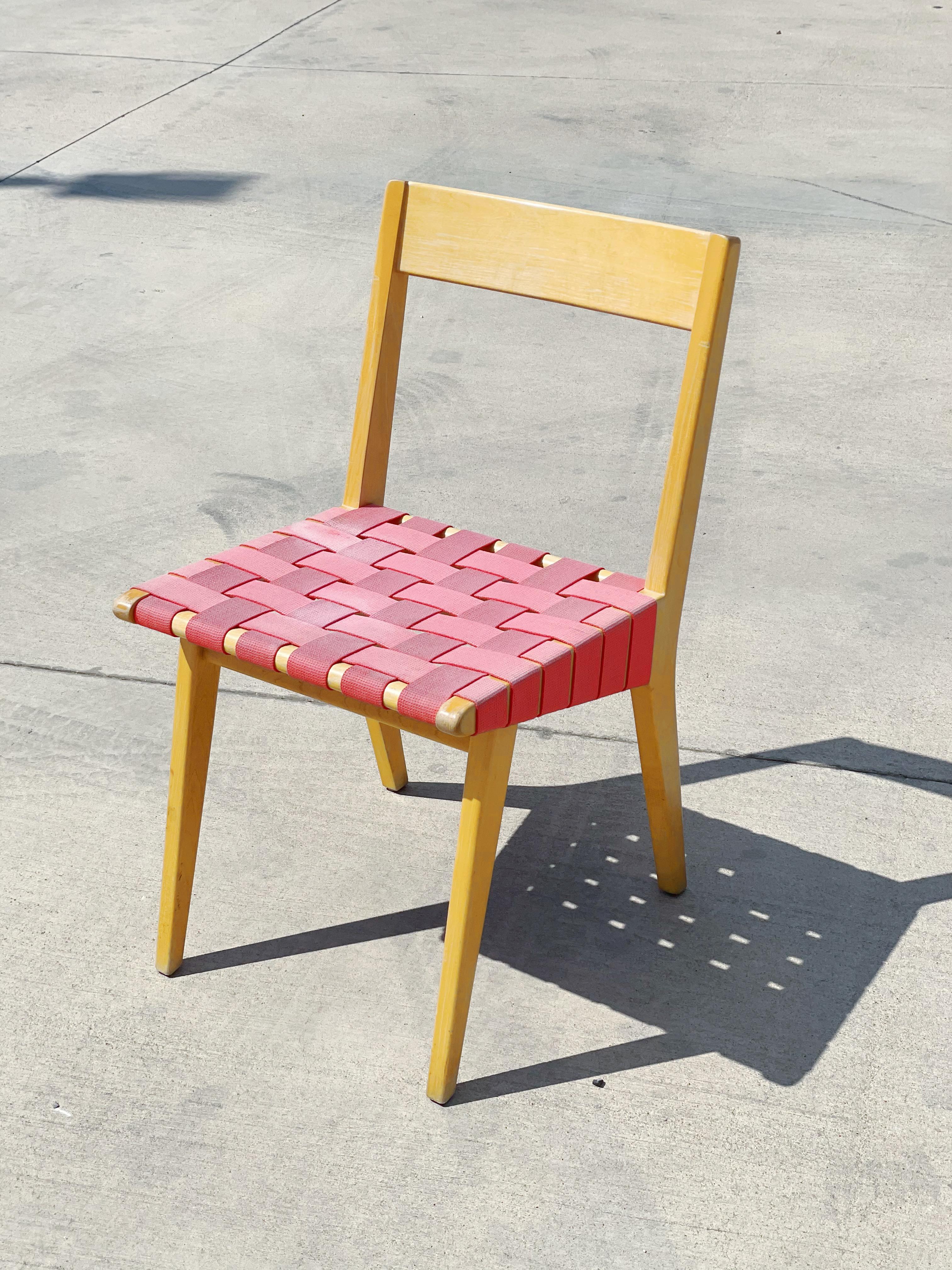1941 Jens Risom for Knoll Chair, Model 666; 600 series

•Some discoloration and fading to the original seat webbing (red fabric)
•Wood frame shows cosmetic signs of wear
•Frame is sturdy and the chair is functional 
•Pricing reflects cosmetic