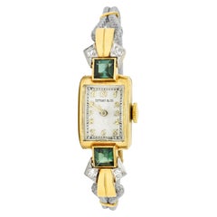 1941 Tiffany & Co. Orologio in oro 14 carati con diamante e tormalina verde e platino