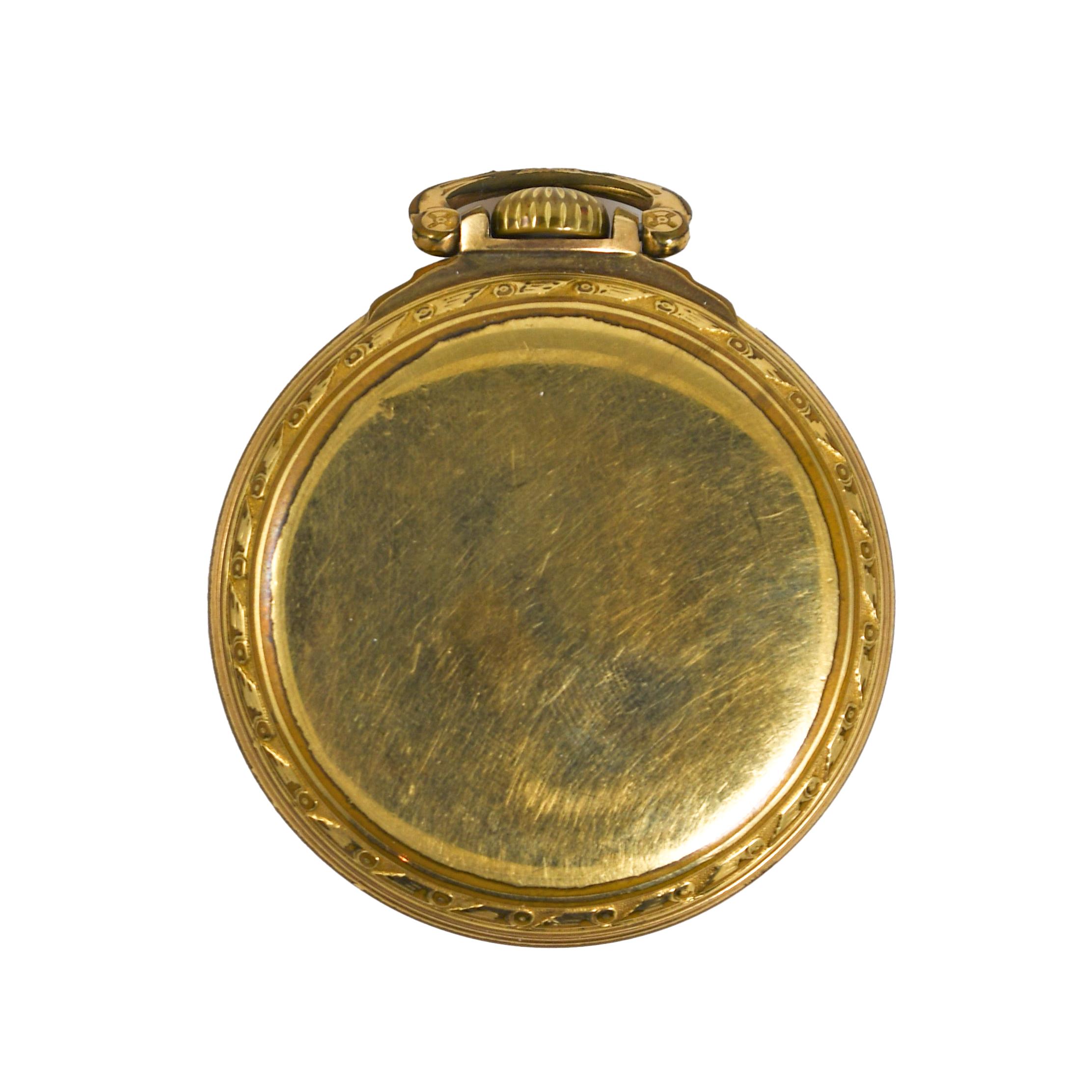 1943-A 16 Größe offenes Zifferblatt Railroad Taschenuhr von Hamilton.
Das einseitig versenkte Montgomery-Zifferblatt trägt rote und schwarze arabische Ziffern in den Stunden- und äußeren Ziffernringen, und das Sekundenzifferblatt trägt schwarze