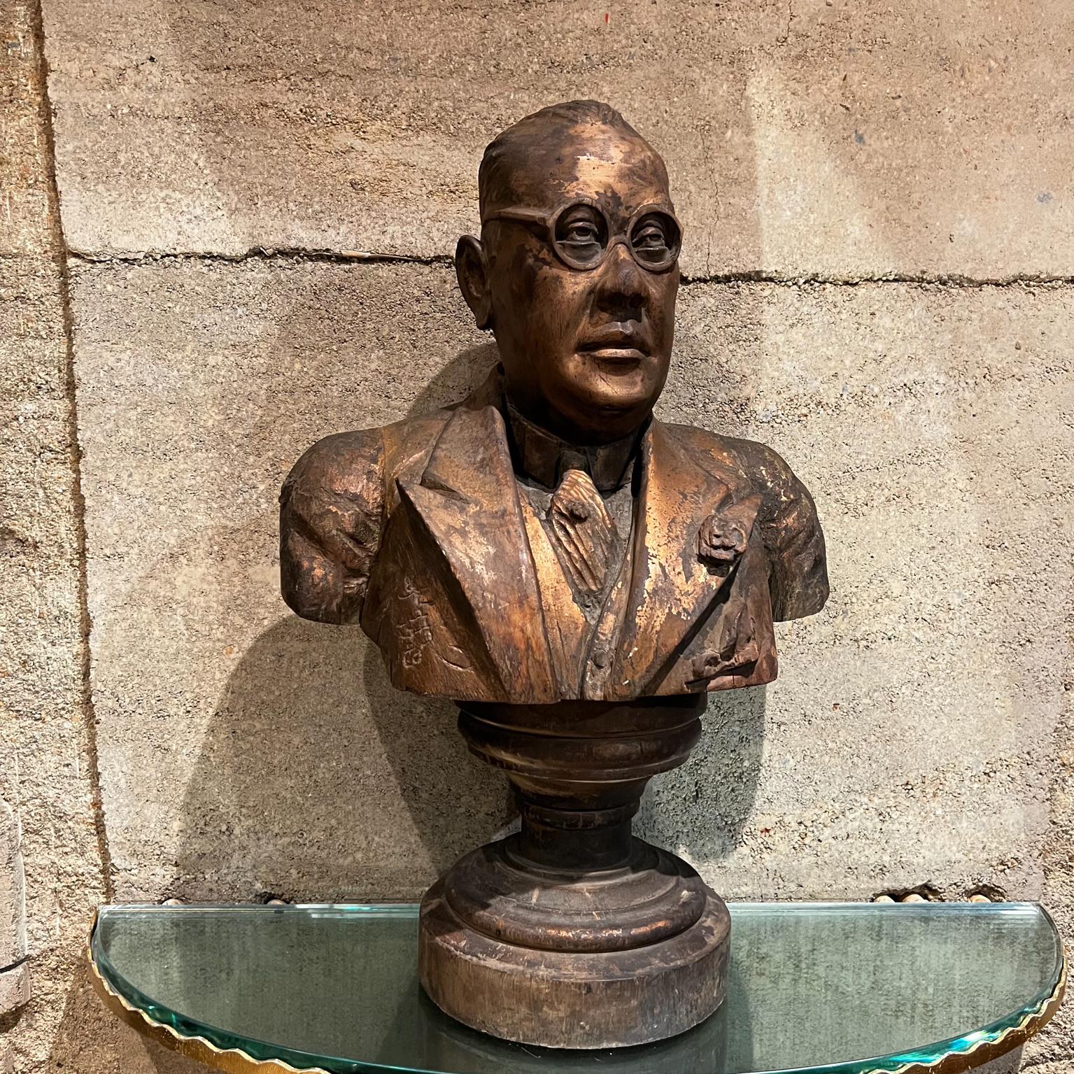 1943 Distinguished Hand Carved Wood Bust Elegant Bespectacled Gentleman Rich Gold Patina.
Solid wood with original vintage unrestored finish. 
Wood appears to be finished with gold paint providing an elegant patina.
Signed by the artist, dated