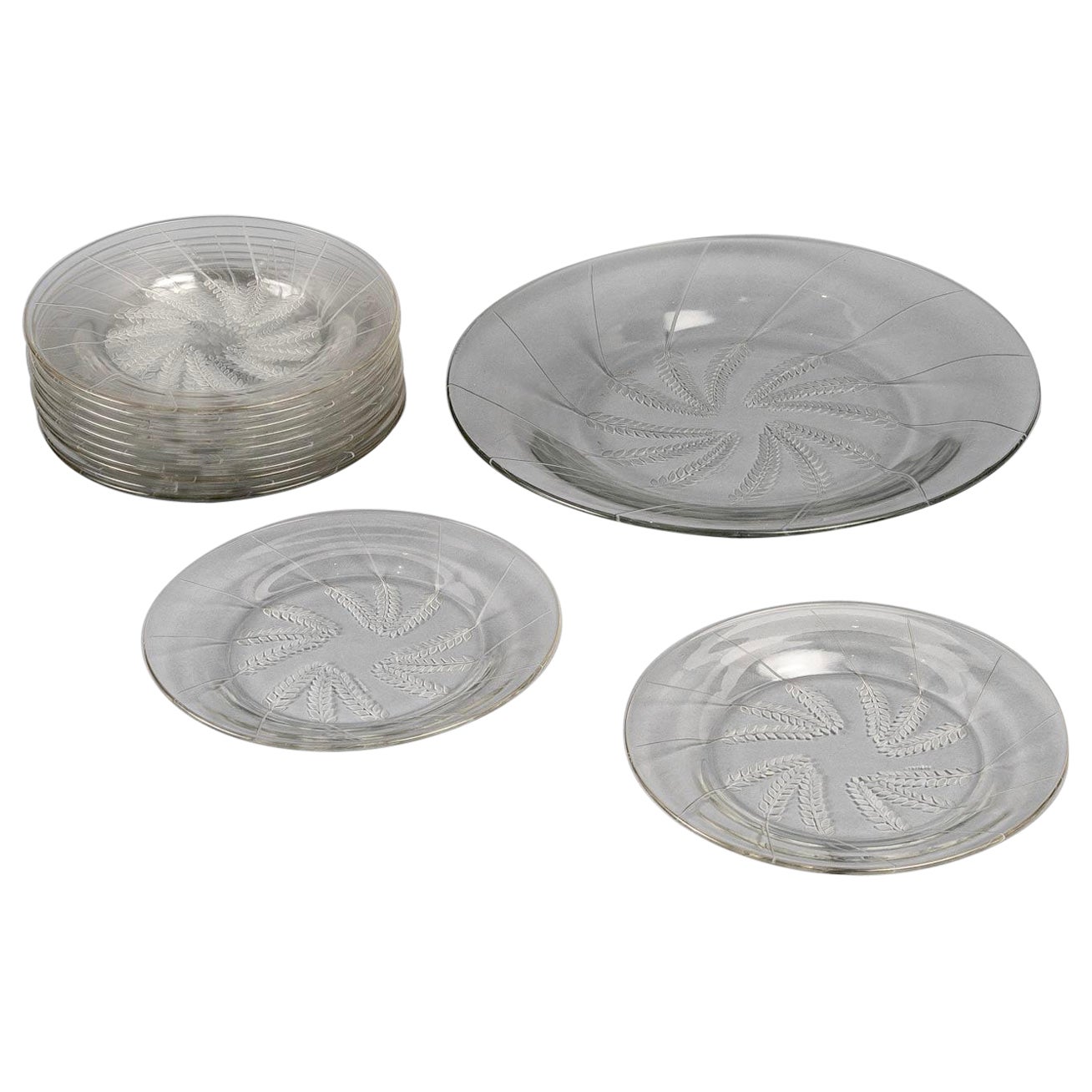 Ensemble de 12 assiettes + 1 plat en verre transparent et dépoli de Lucerne de 1943 Ren Lalique
