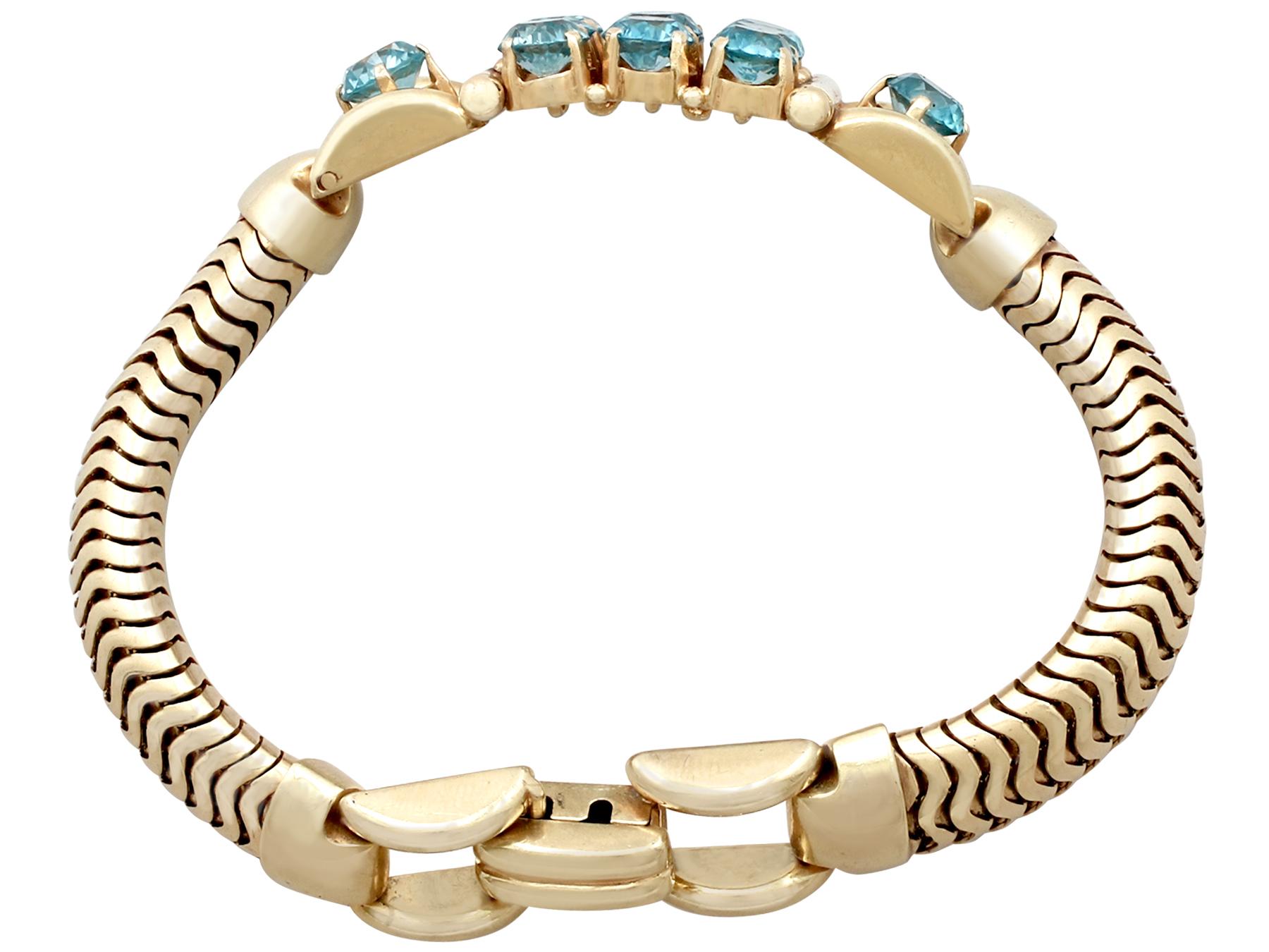 An impressive vintage Art Deco style 12.59 carat high zircon and 14 karat yellow gold bracelet; part of our diverse gemstone jewelry and estate jewelry collections

This stunning, fine and impressive vintage zircon bracelet has been crafted in 14k