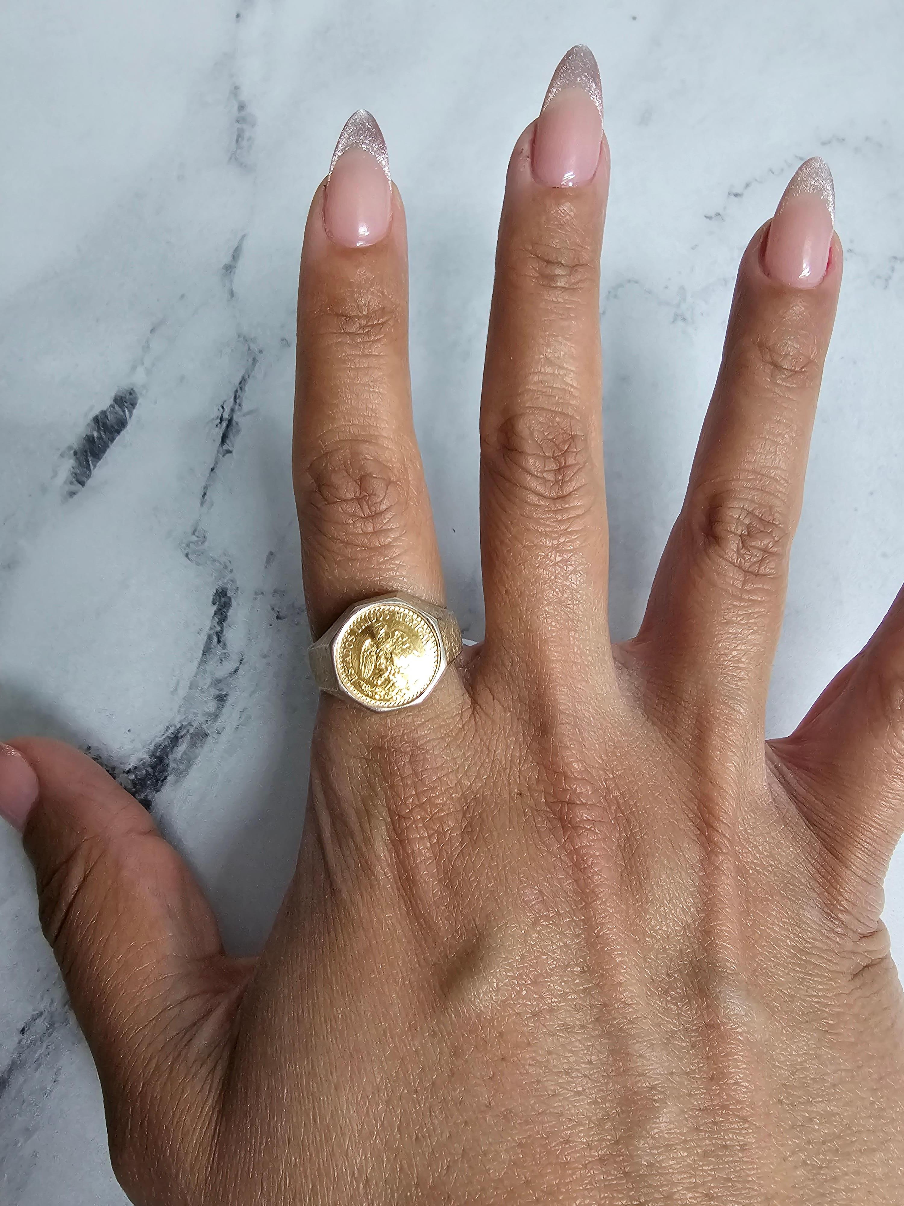 1945 Vintage Dos Pesos Brushed Satin Coin Ring 14k Yellow Gold 

This exceptional ring captures the essence of antiquity and sophistication, boasting a unique brushed satin finish that adds a touch of elegance. With its historical significance and
