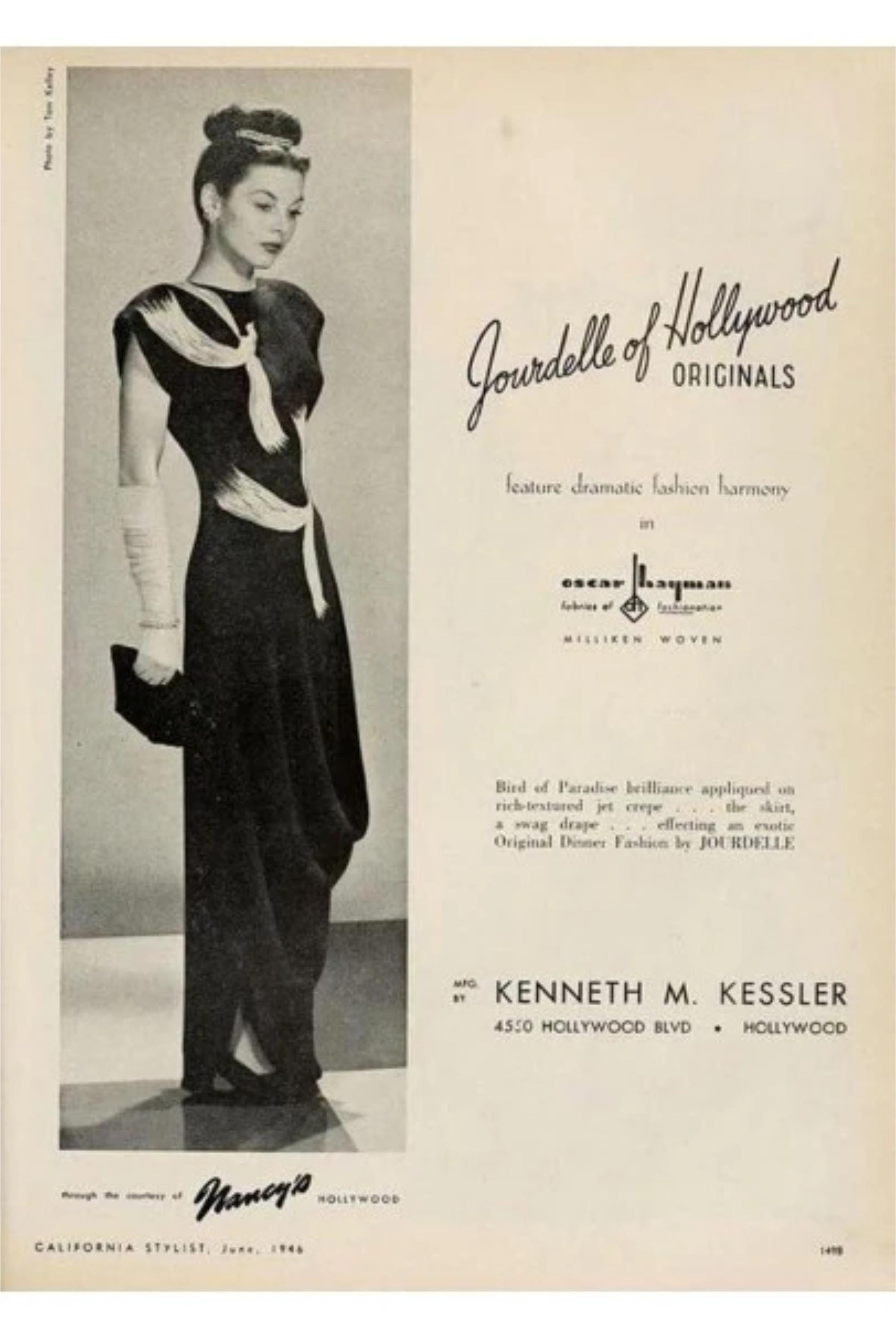 A sensational and highly coveted Jourdelle of Hollywood documented flying phoenix firebirds rayon crepe gown dating back to 1946. The Smithsonian holds a similar example within their collection which is attributed to the famous costume designer