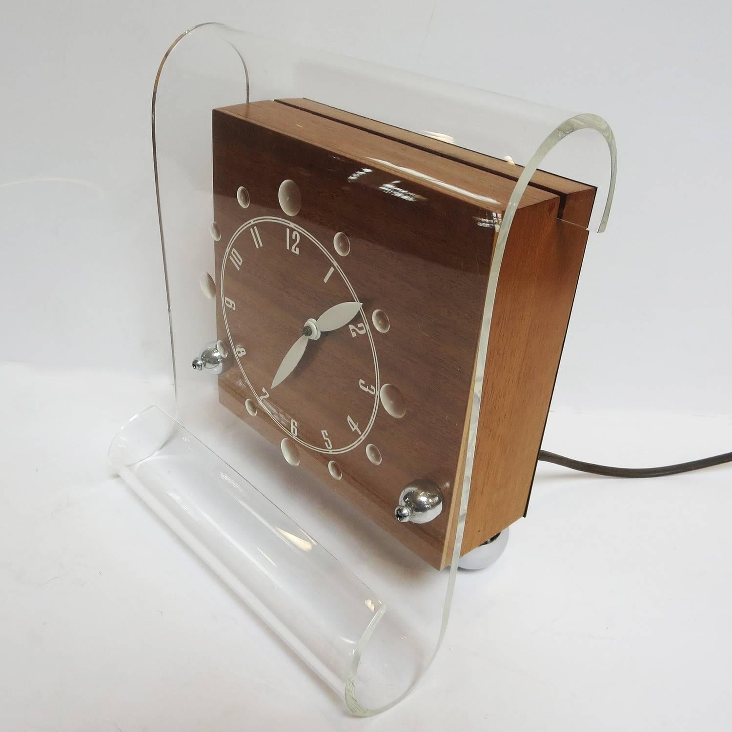Best known for large exterior neon signs and clocks, the Lackner company also offered a short lived line of neon clocks for the home. They probably weren't widely received, evident in the scarcity of them today. They featured cases in catalin,