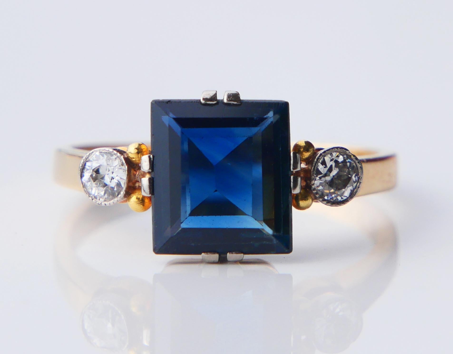 Three Stone Cluster Ring in solid 18K set with octagon cut natural Blue Sapphire accented with 2 old European cut Diamonds in Platinum settings. This sturdy Art- Deco inspired design was very popular in Sweden and Germany since late 1910s to early