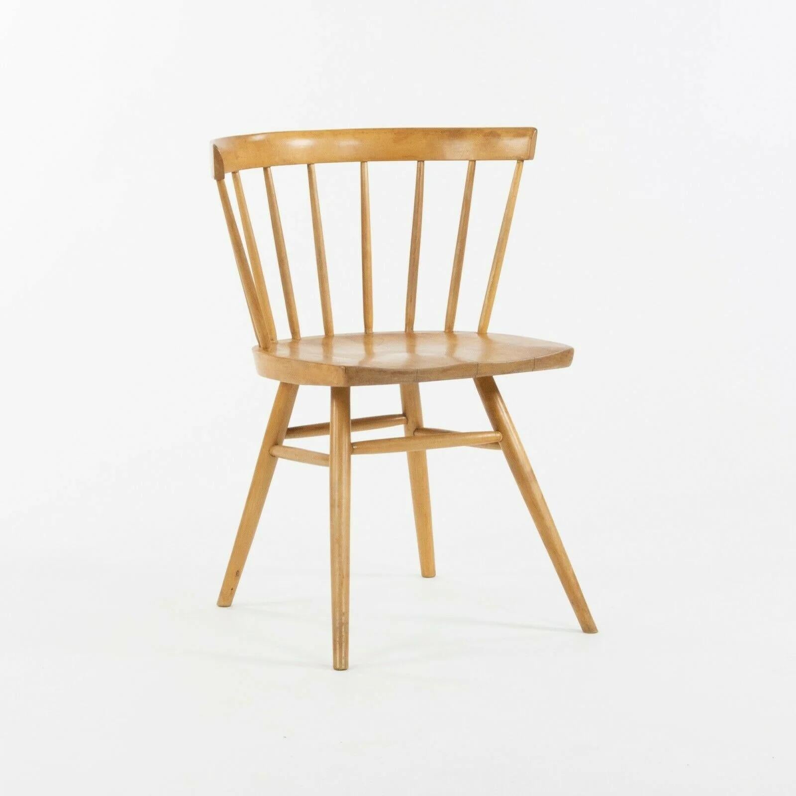 Listed for sale is a gorgeous early George Nakashima for Knoll N19 birch straight chair, produced by Knoll Associates. This chair appears to be natural birch. It shows some wear from use as can be seen in the photos. Some light scratches and other