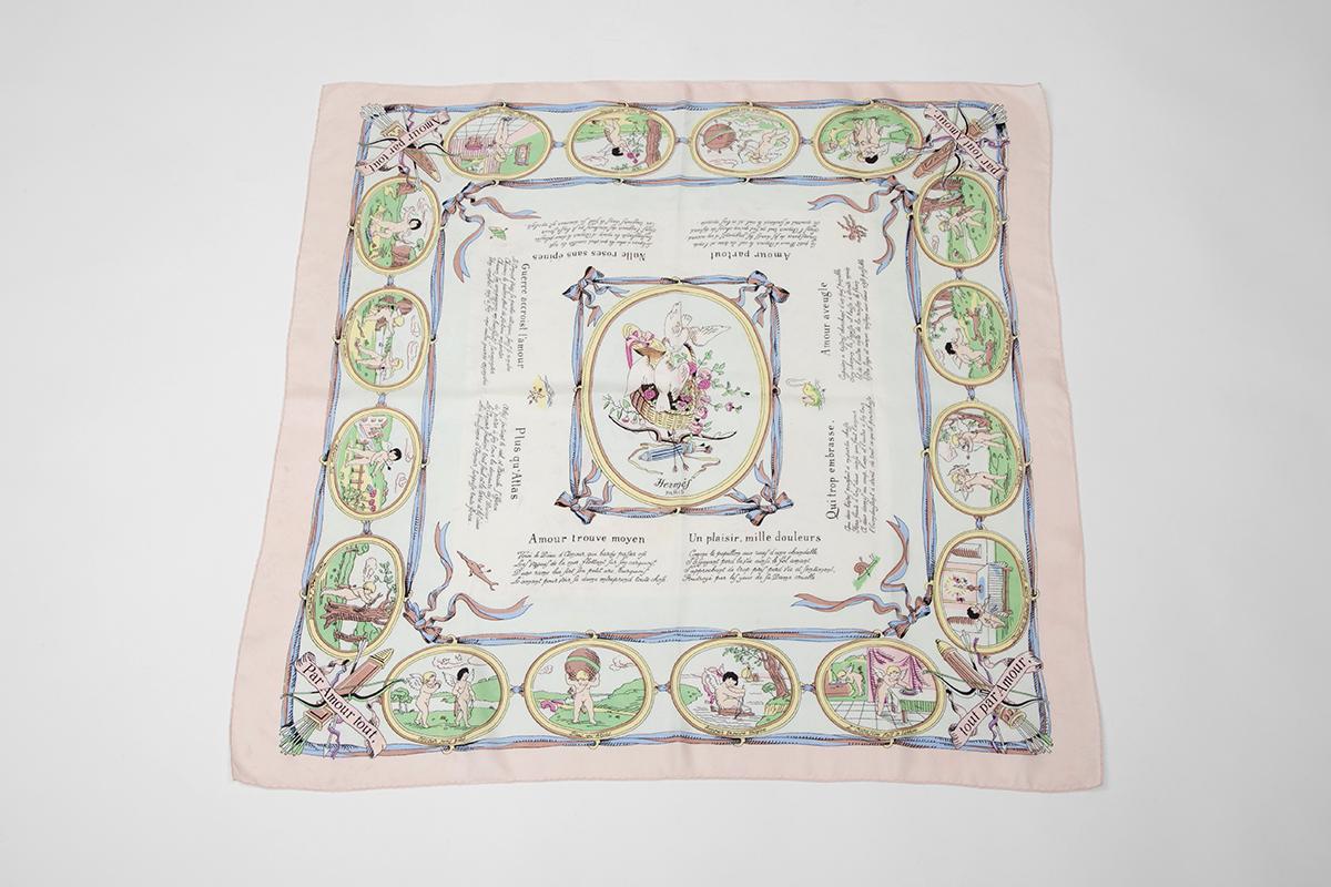 Extremely rare Hermès “Les Amours” silk twill Carré scarf. Signed by Hugo Grygkar and issued in 1947, this scenic print with little Cupids remains an “one-of-a-kind” Carré scarf for any serious Hermès collector.

Dimensions : 
approx. 90 x 90 cm