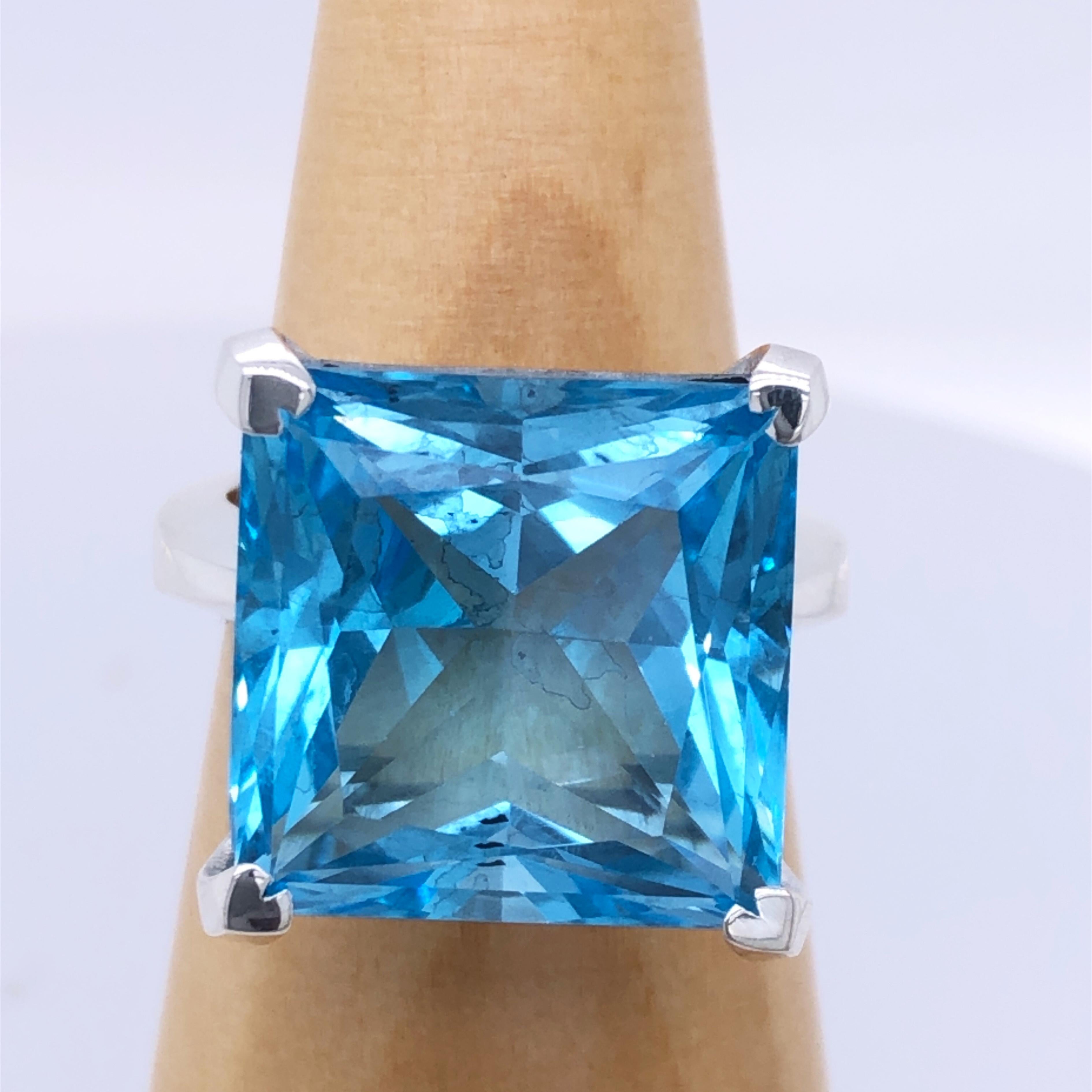One-of-a-kind 19.47 Carat Princess Cut Natural Light Blue Topaz(0.669inches lenght 0.669inches width, 17x17mm) in a Chic yet Timeless mirror Finish Sterling Silver Cocktail Setting.
We are proud to offer this awesome piece perfect as Engagement Ring