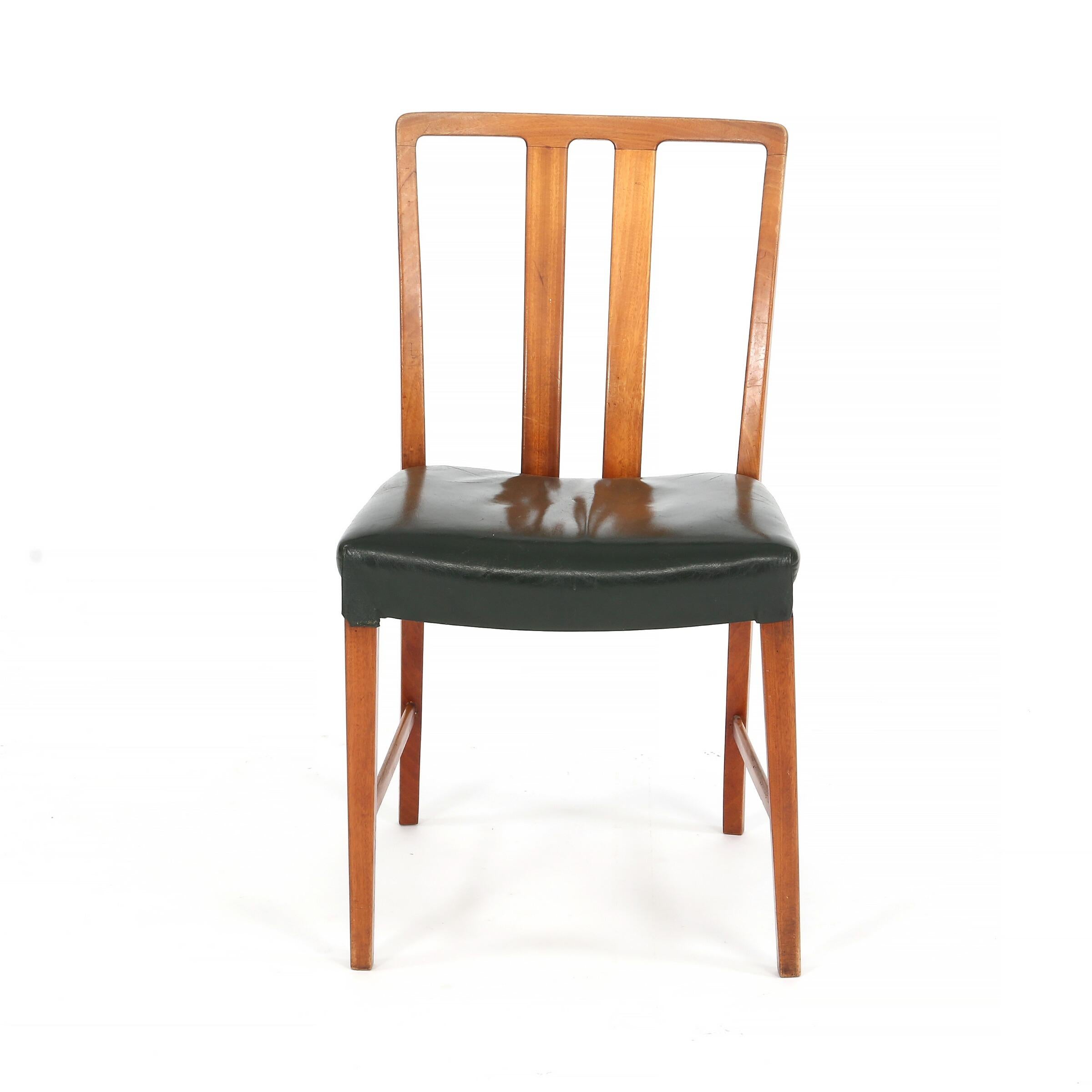 1947 Peder Pedersen, set of six solid wood dining chairs of mahogany and seats upholstered with black leather. Made by cabinetmaker Peder Pedersen. Presented at the Copenhagen Cabinet-makers' 21th Guild Exhibition 1947. Literature: Grete Jalk[Red.]