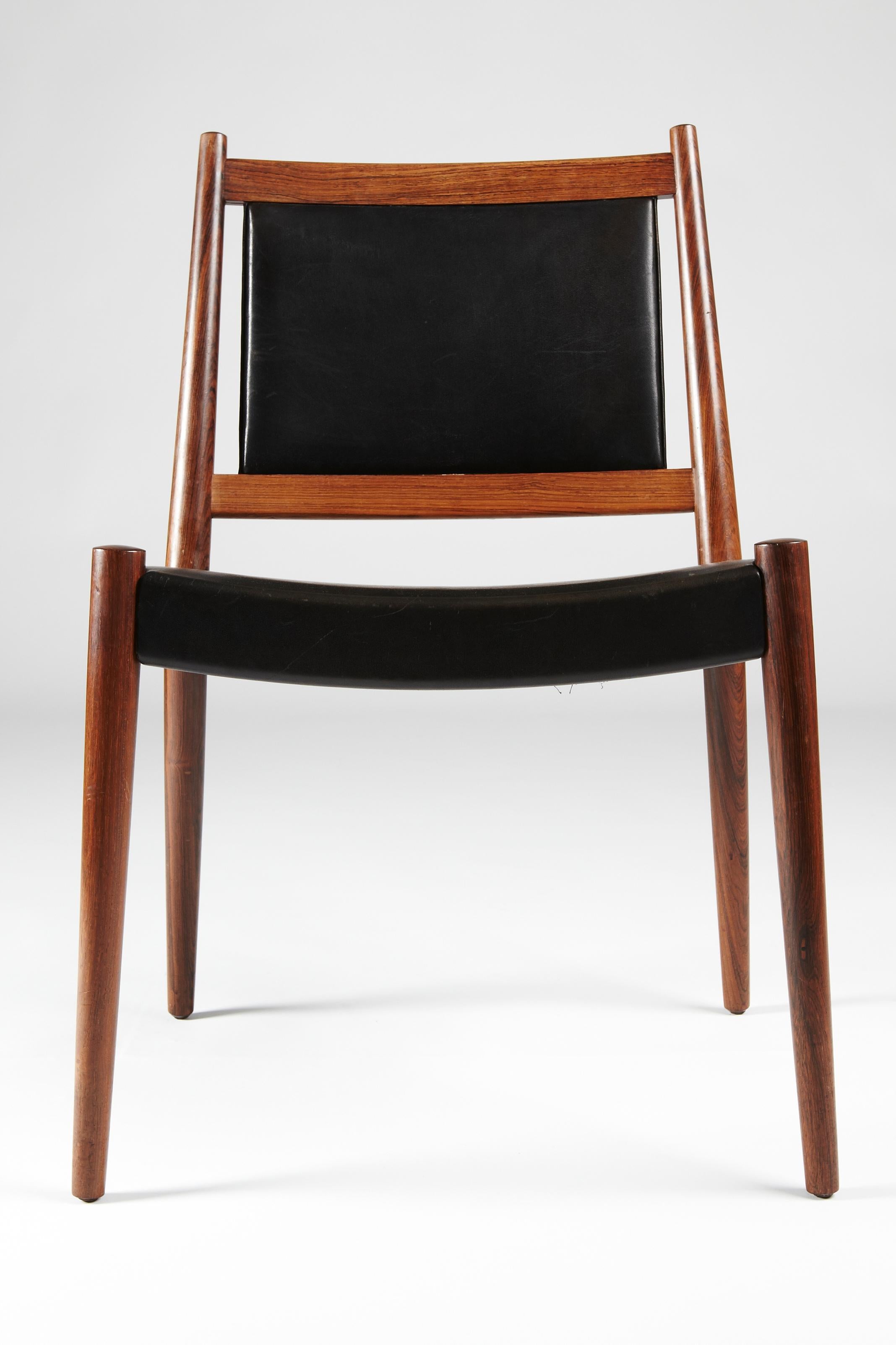 Danish 1947 Steffen Syrach-Larsen, 16 Solid Wood Chairs, Patinated Leather Upholstery For Sale