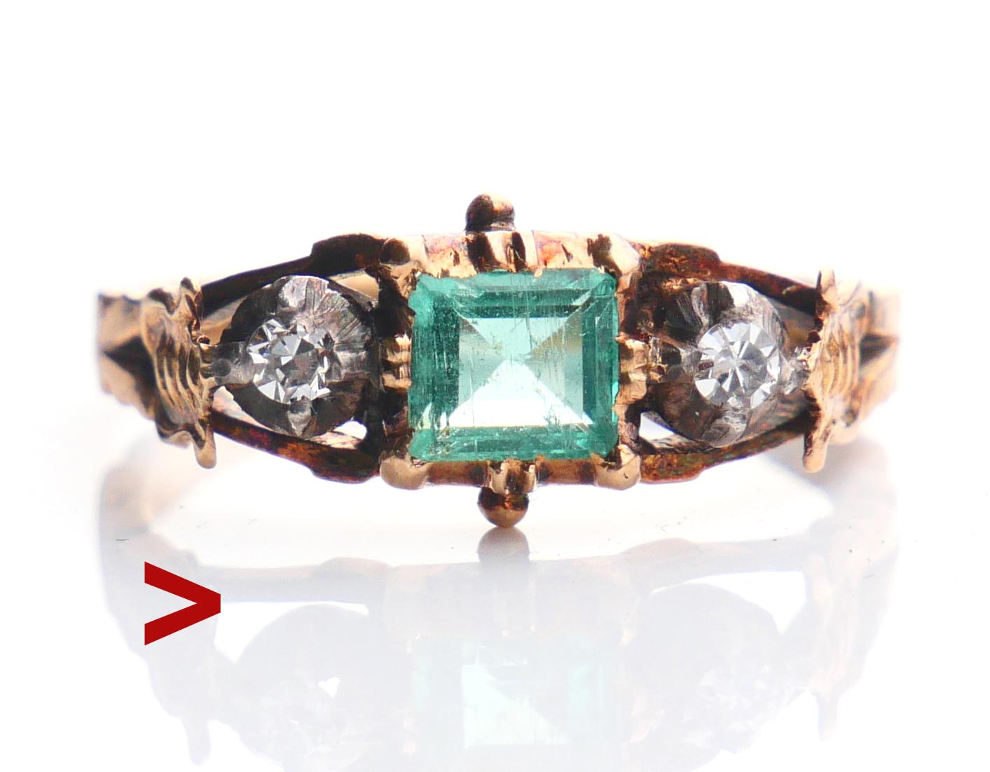 Nordic Renaissance styled ring with carved band in solid 18K Yellow Gold. Claw set Natural Emerald / emerald cut 5 mm x 4.8 mm x 3 mm deep / ca. 08 ct and flanked with two old diamond cut Diamonds in round Silver clusters Ø 2.5 mm / 0.06 ct. each