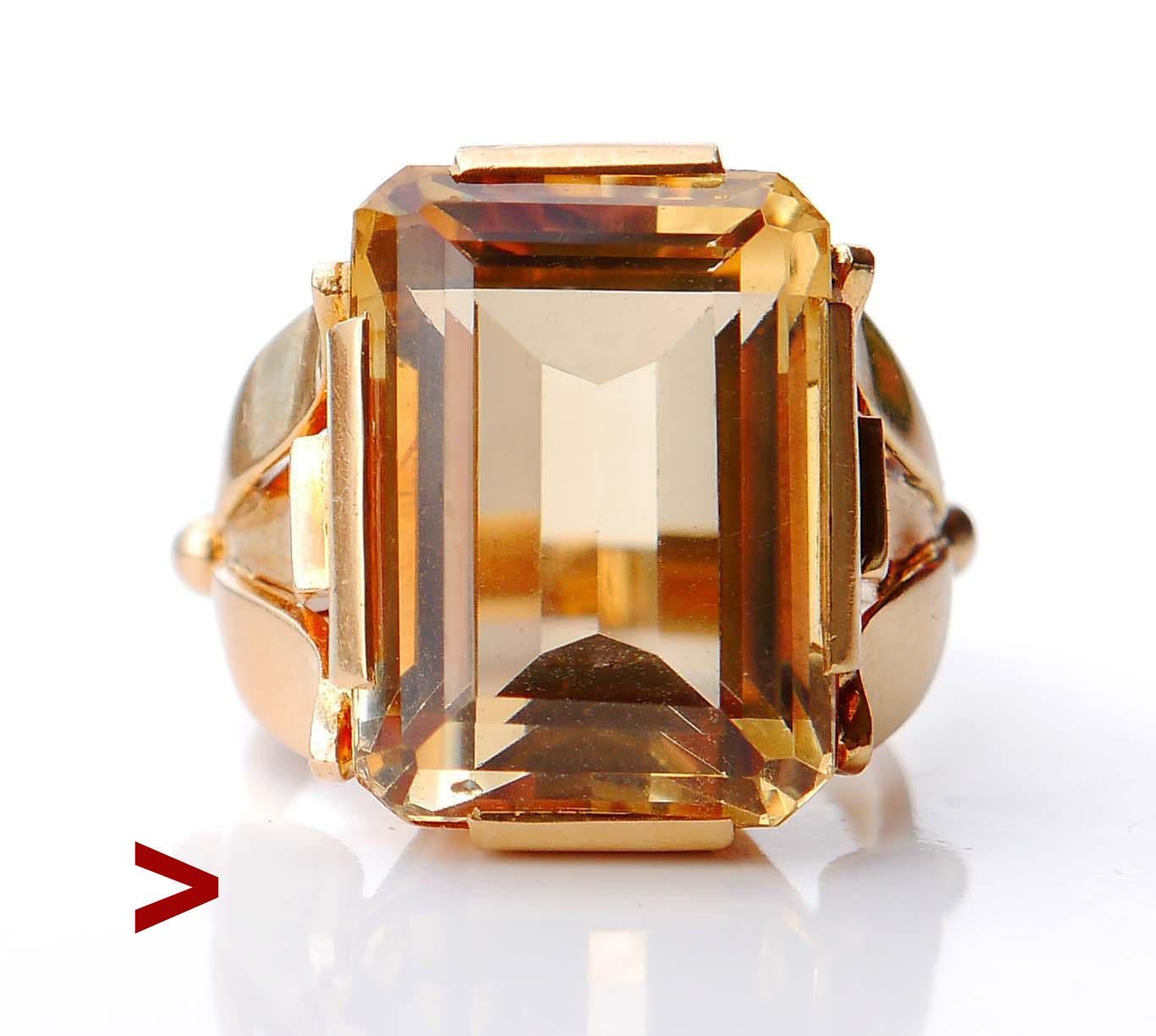
Swedish Cocktail Ring featuring large natural Citrine stone.

The band and crown  in solid 18ct Yellow Gold, step- cut Citrine 18 mm x 13 mm x 10 mm deep / ca 20 ct. The stone is of the finest quality and eye-clean.

Set of Swedish hallmarks, 18K,