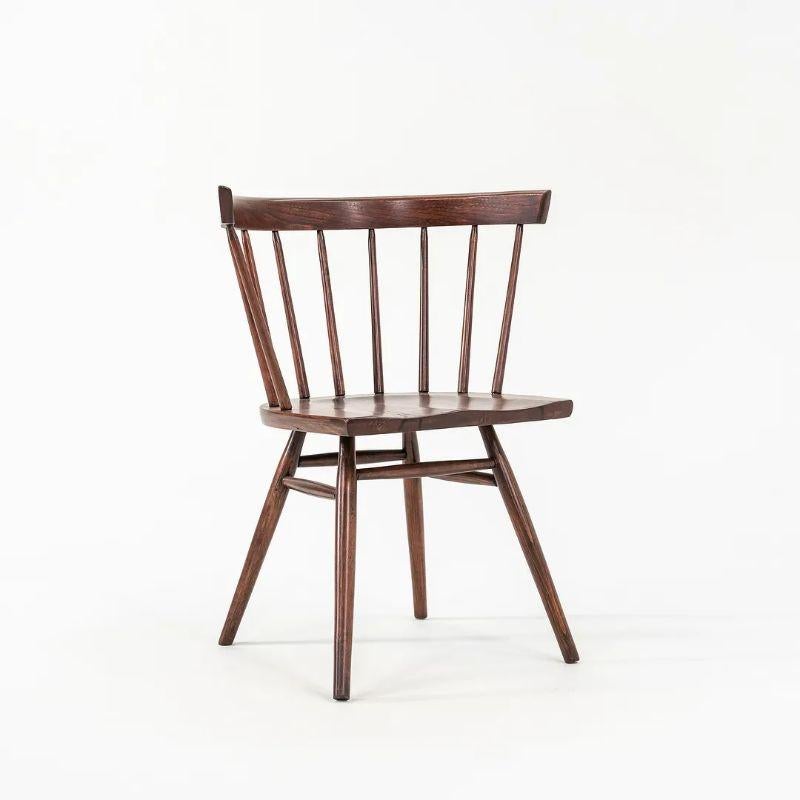 This is a set of four N19 Straight Chairs, designed by George Nakashima for Knoll Associates in 1946. These are early examples, dating to circa 1949. The ‘Straight Chair’ was Nakashima’s modern, minimalist take on the Windsor chair. Of this set, two
