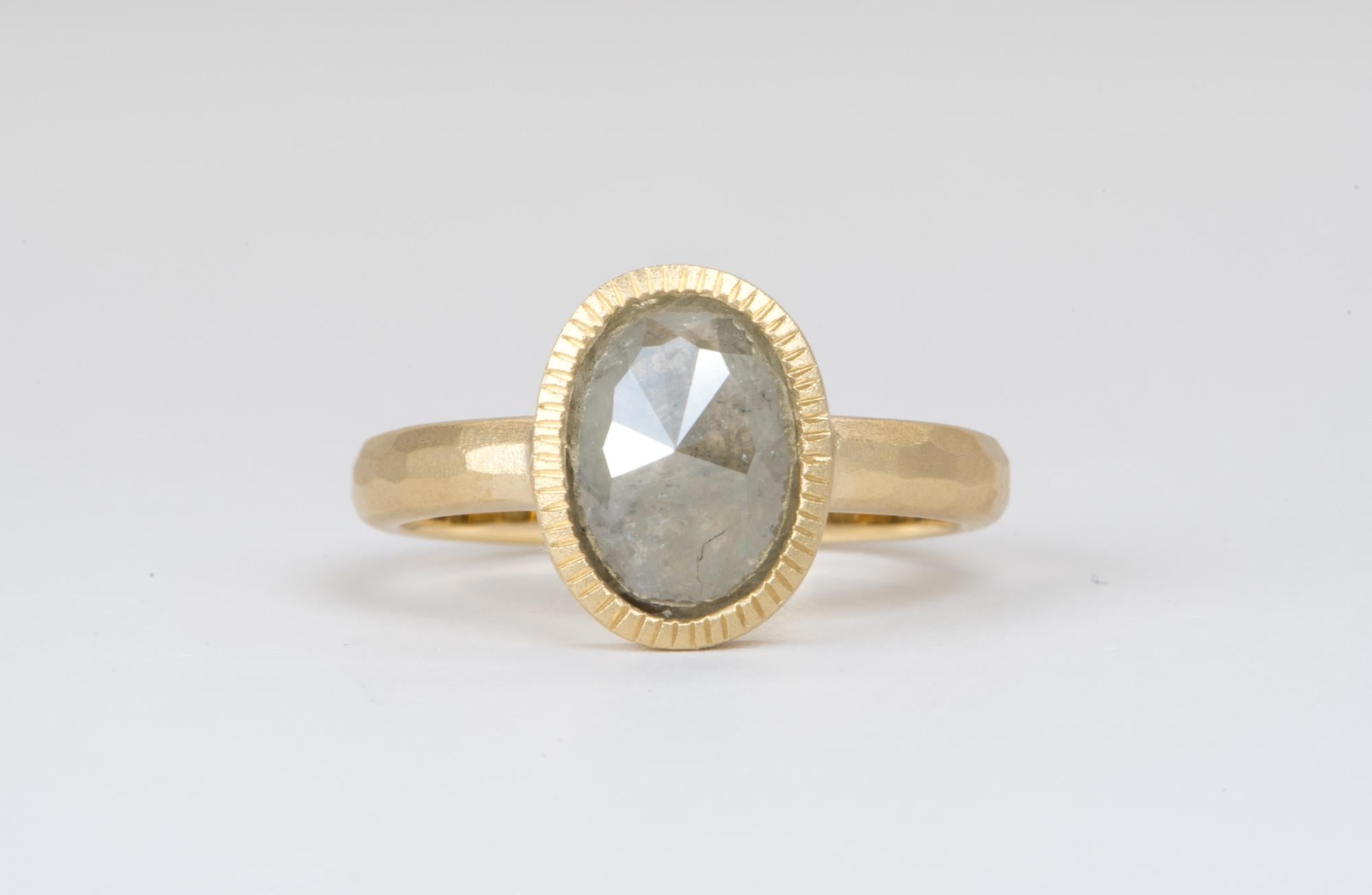 ♥  Solid 14K yellow gold ring set with an oval-shaped salt and pepper diamond in the center, bezel set with a hammered matte finish
♥  The overall setting measures 9.3mm in width, 11.8mm in length, and sits 4.4mm tall from the finger

♥  US Size