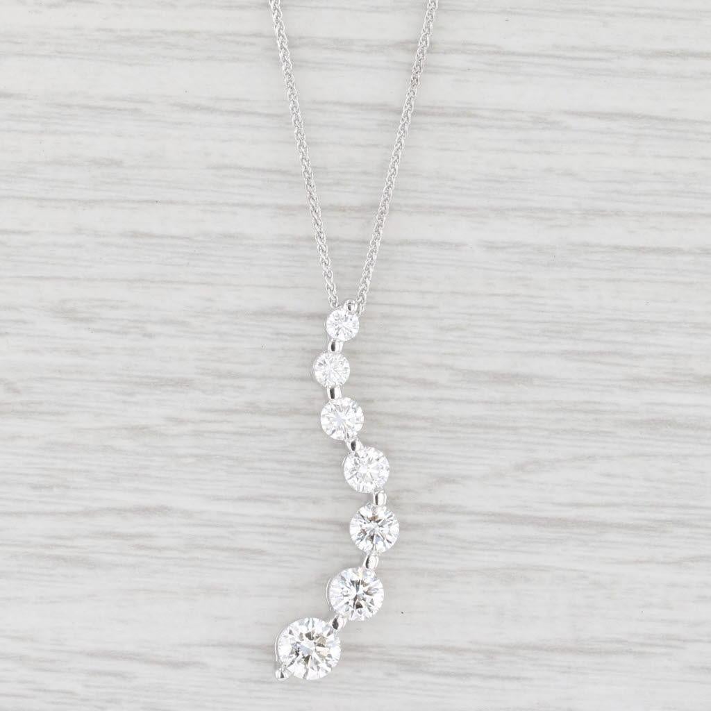 Gem: Natural Diamonds - 1.94 Total Carats, Round Brilliant Cut, G - H Color, VS2 - SI2 Clarity
Metal: 18k White Gold
Weight: 5 Grams 
Stamps: 18k, 750
Style: Wheat Chain
Closure: Lobster Clasp
Chain Length: 18