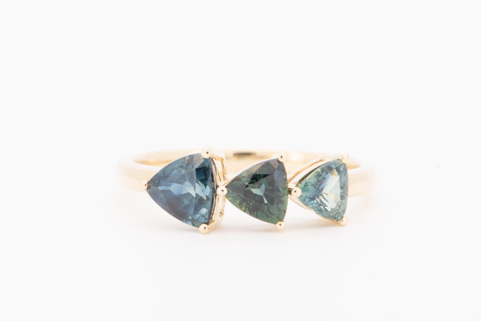 ♥ 1.94ctw Graduated Size Teal Blue Journey Sapphire Ring 14K Gold R6746
♥ The item measures 6.3mm in length, 15.8mm in width, and 4.2mm in thickness. Band width is 1.8mm.


♥ Ring size: US Size 7 (Free resizing up or down 1 size)
♥ Material: 14K