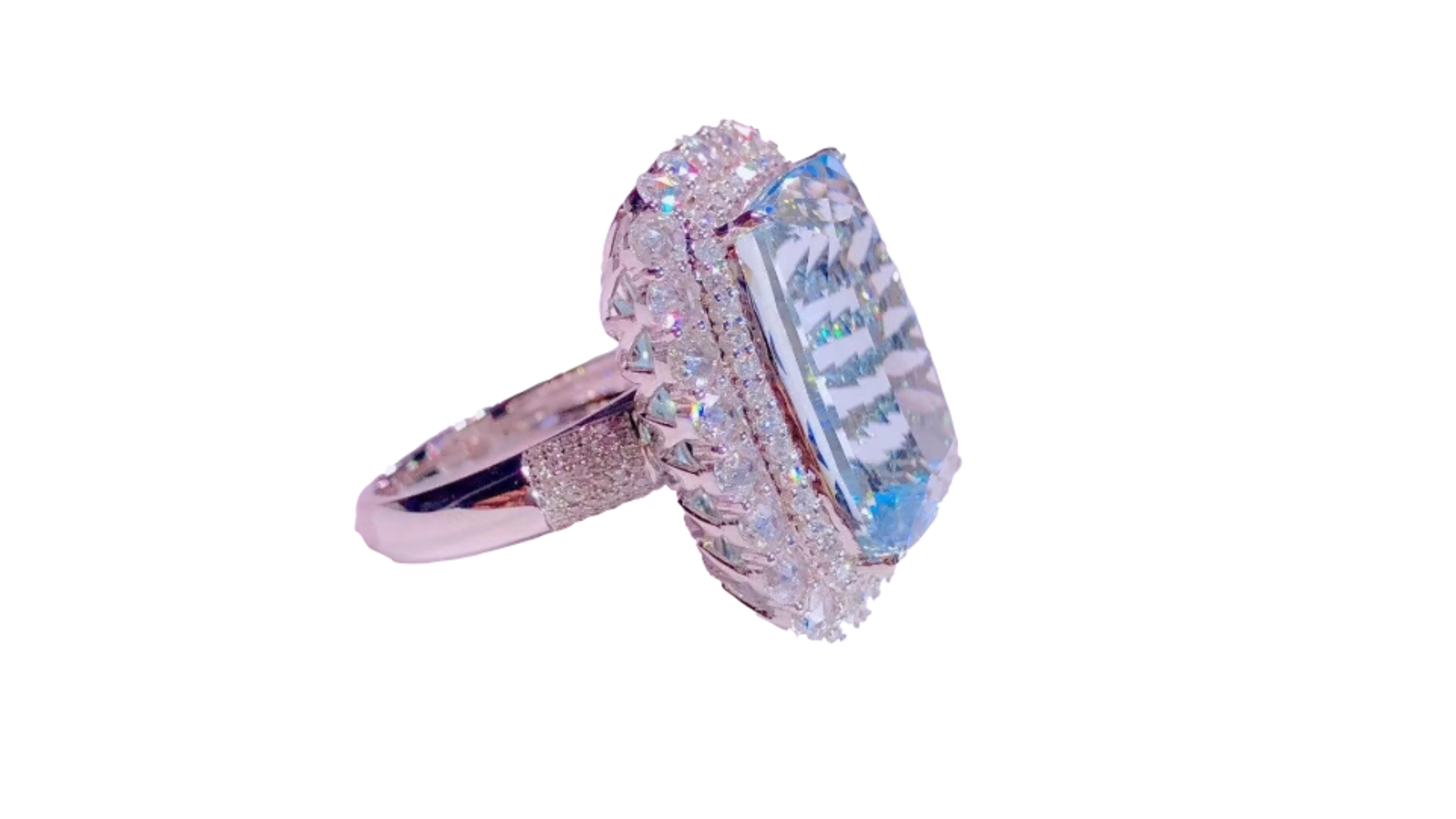 This is a wow factor for a Aquamarine Ring  at 19.5CT with 202 White Diamonds and can also be a pendant too as you can see in photos with the bail that flips out. 



Aquamarine with diamonds at each side and sparkling like a crystal clear ocean, it