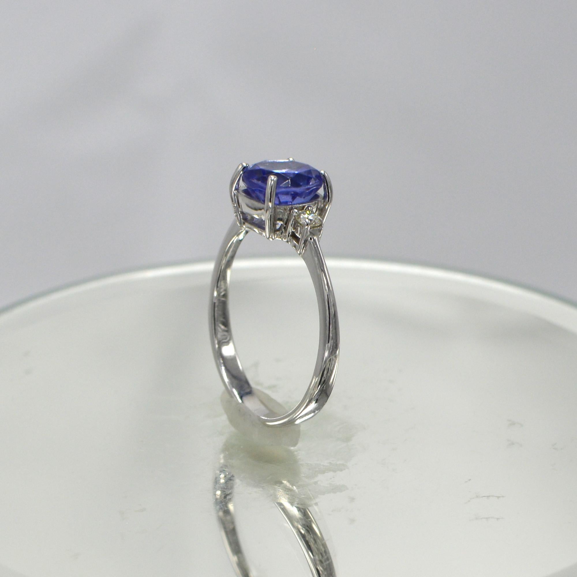 Round Cut 1.95 Carat Blue Tanzanite Ring 18 Karat White Gold with Diamonds For Sale