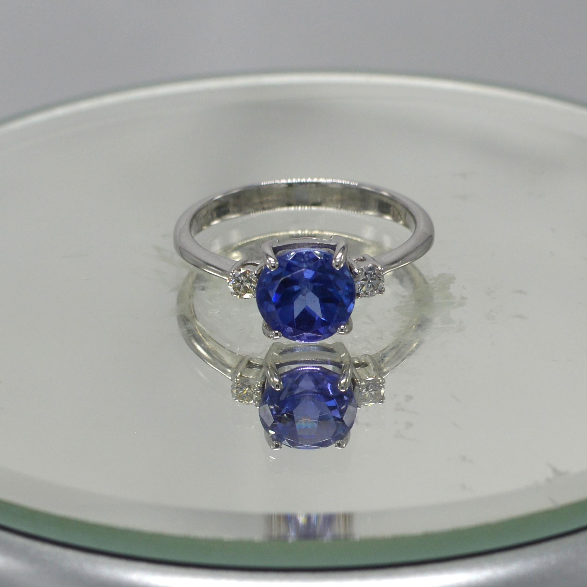 Women's 1.95 Carat Blue Tanzanite Ring 18 Karat White Gold with Diamonds For Sale