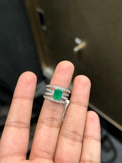 1.95 Carat elongated emerald-cut Emerald & Diamond Cocktail Ring in Platinum 900