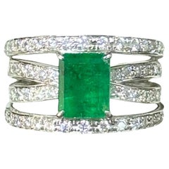1.95 Carat elongated emerald-cut Emerald & Diamond Cocktail Ring in Platinum 900
